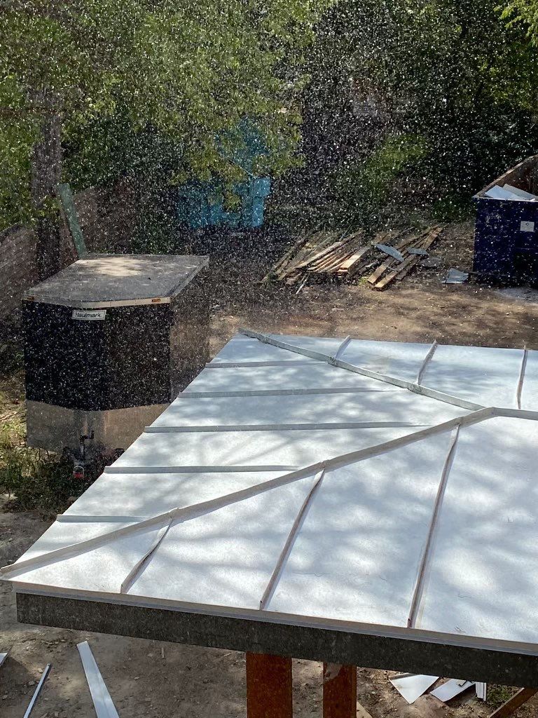 Residential Metal Roof Installation using McElroy Metal by Premier Roofing and Contracting
