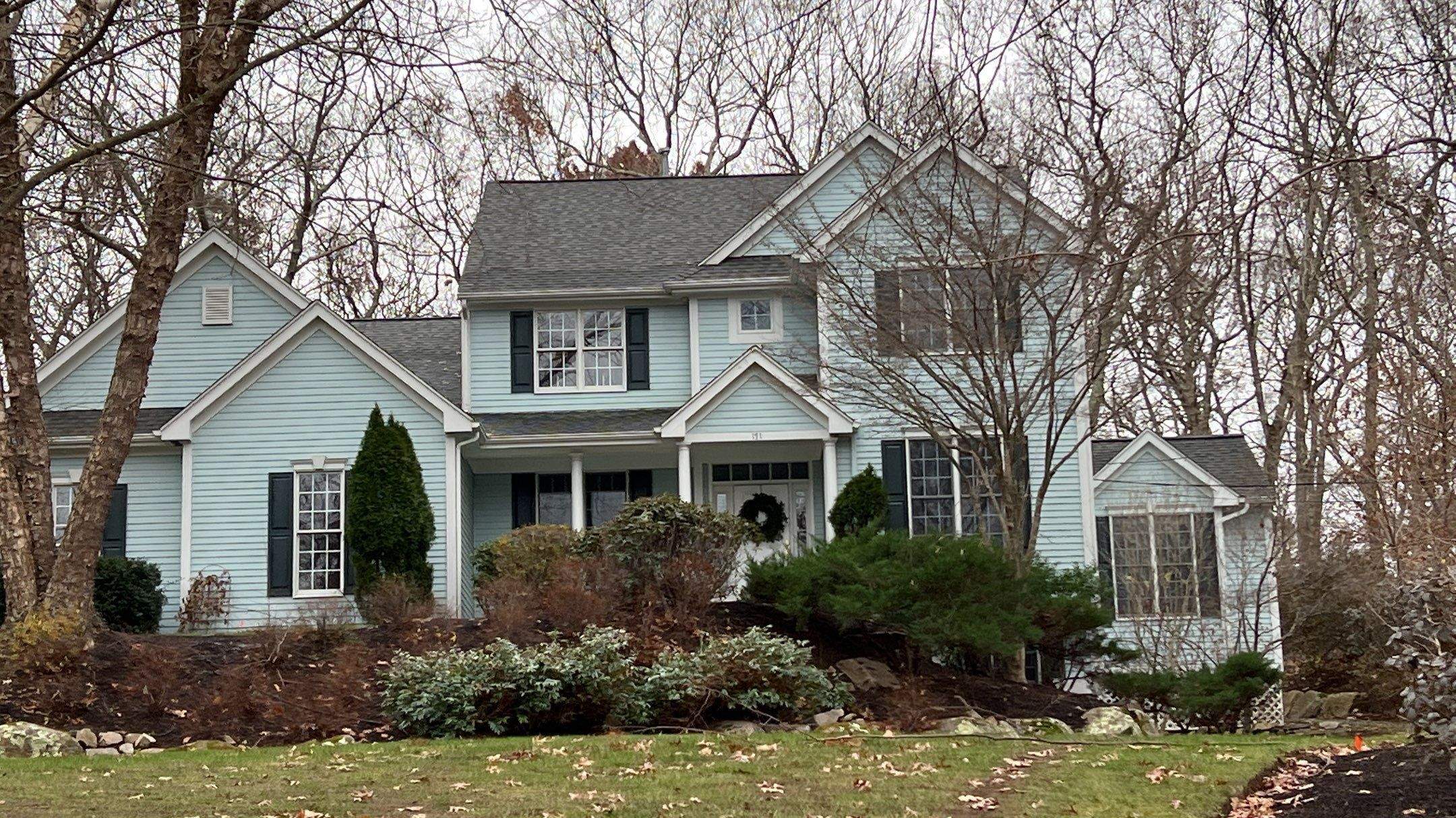 Pewterwood Roofs by Pinnacle Roofing & Skylights