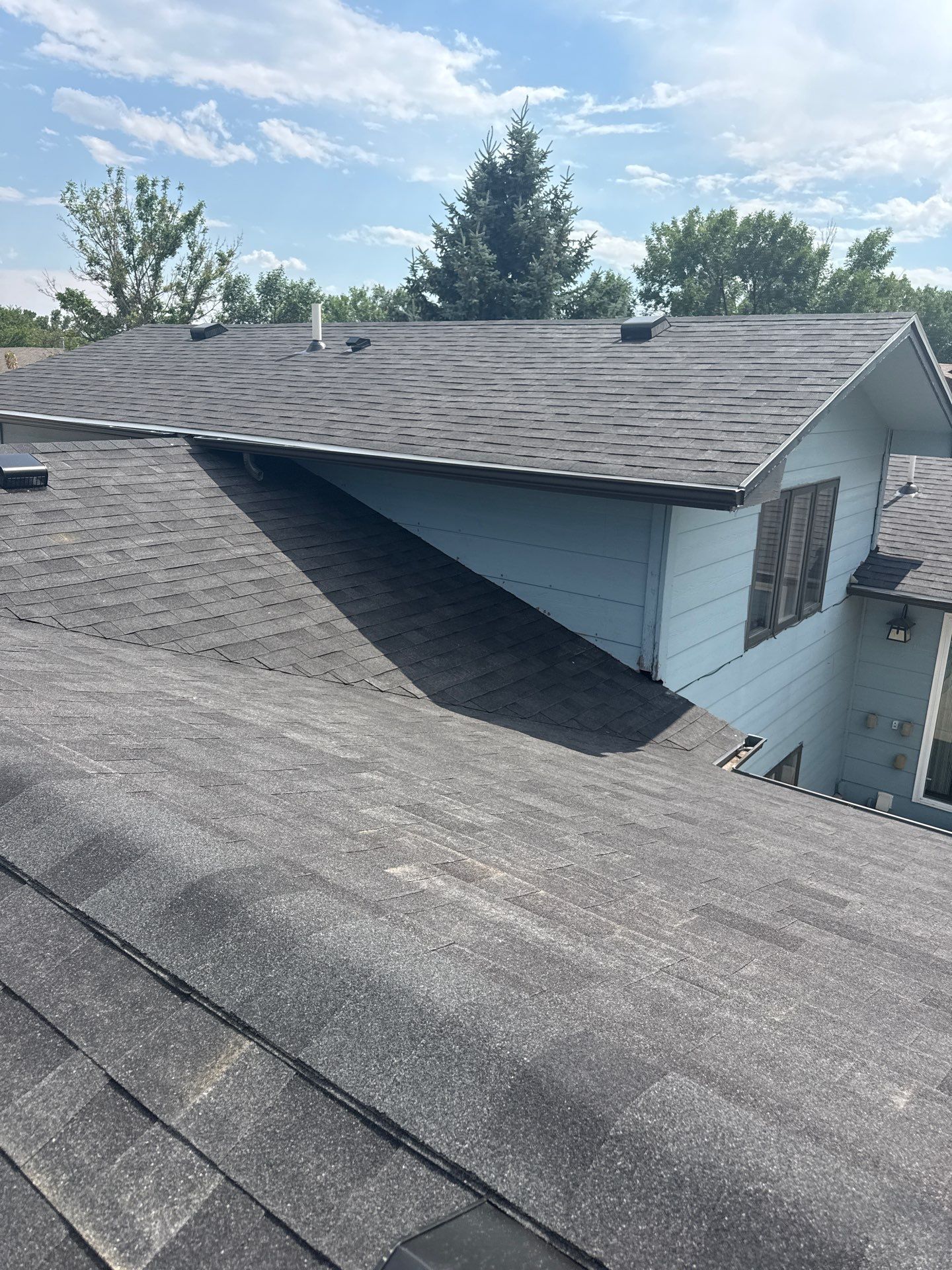 Full Architectural Shingle Roof Replacement and Gutter Installation in Rapid City by Weather-Tite Exteriors LLC