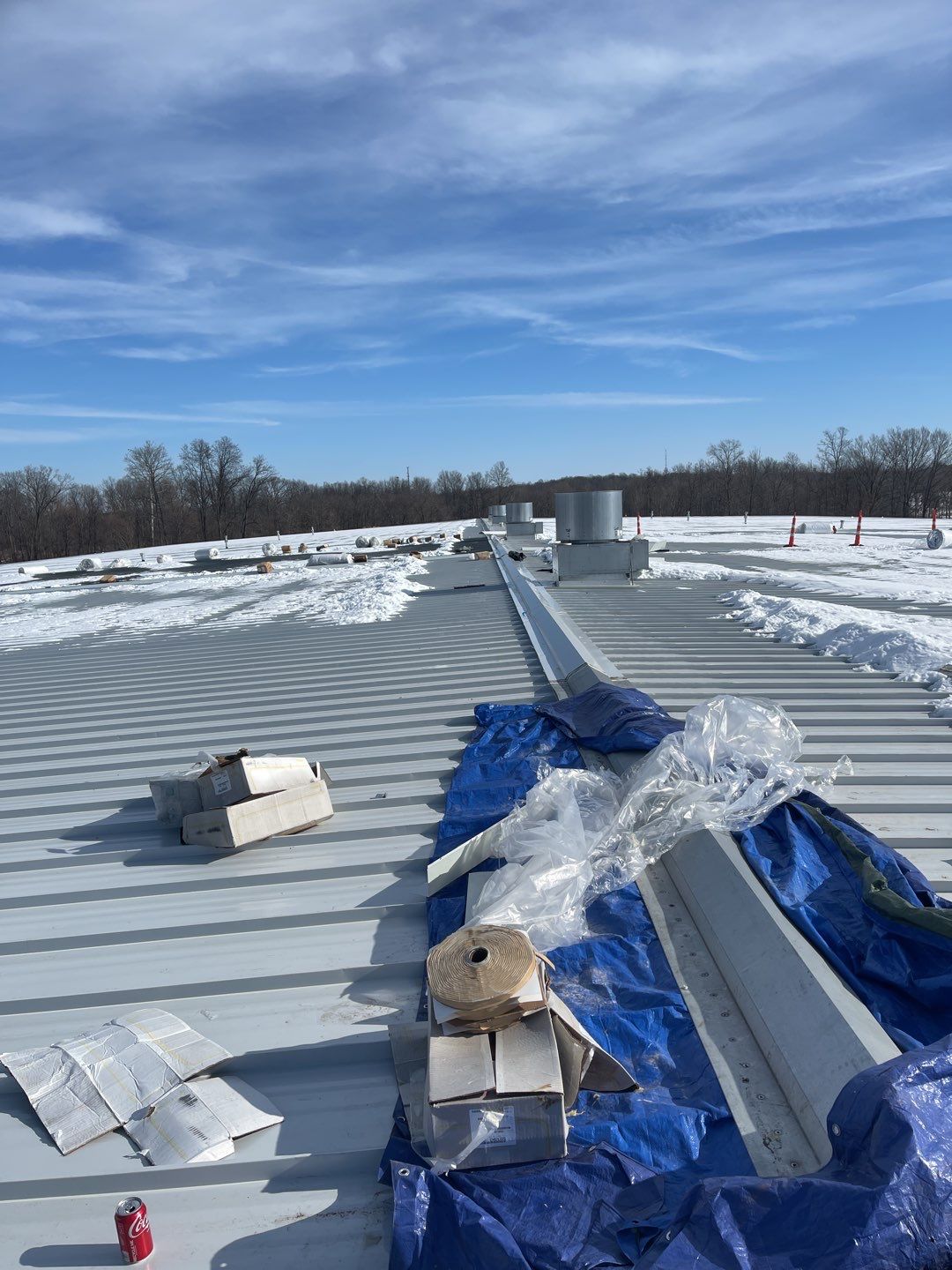 Commercial Roofing Installation using 24 Guage Double Lock Standing Seam by CentiMark Roofing