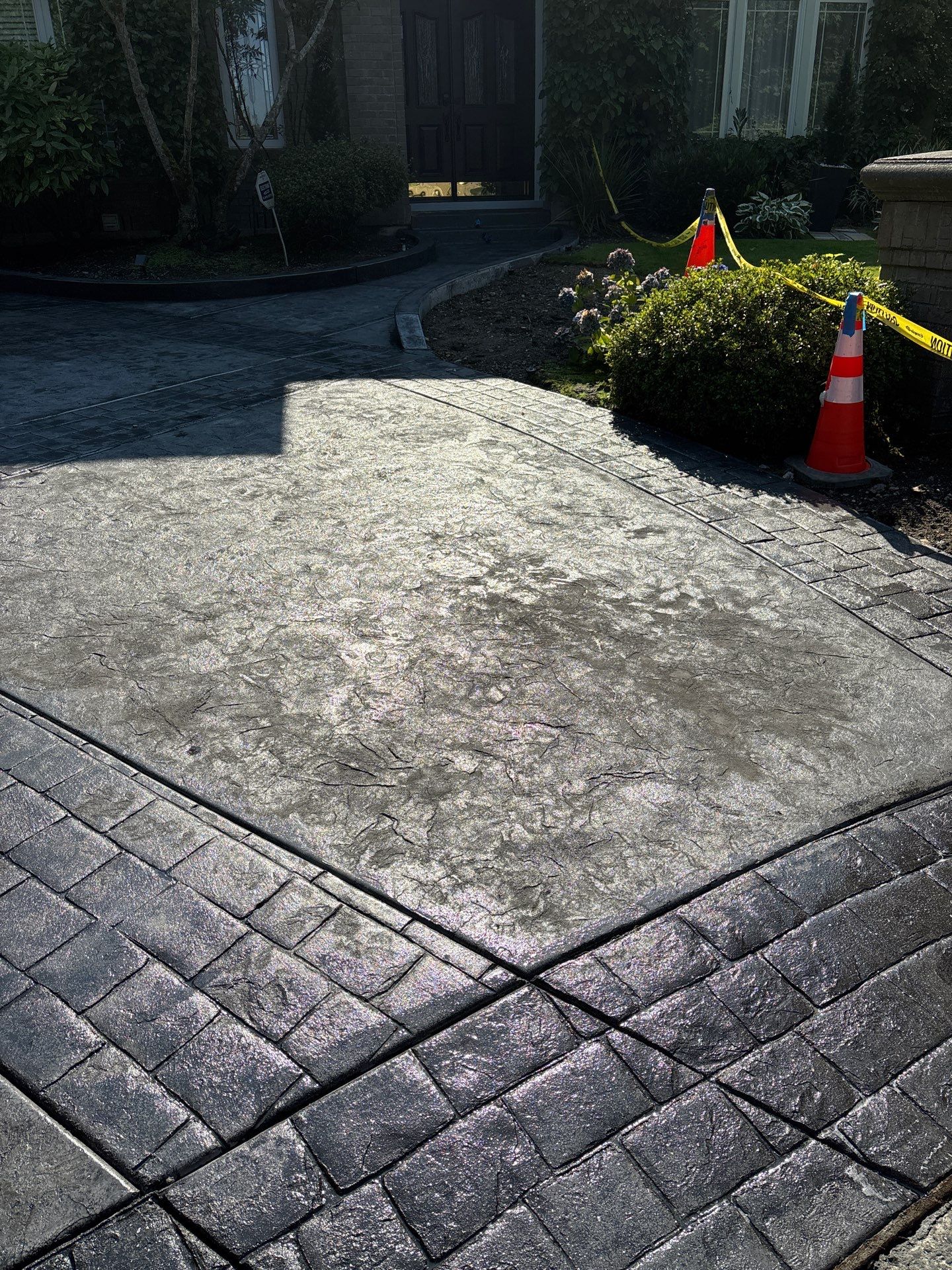 Multi-color Stamped & Sealed Concrete Driveway Renovation | Mukilteo by Jireh Asphalt & Concrete Inc