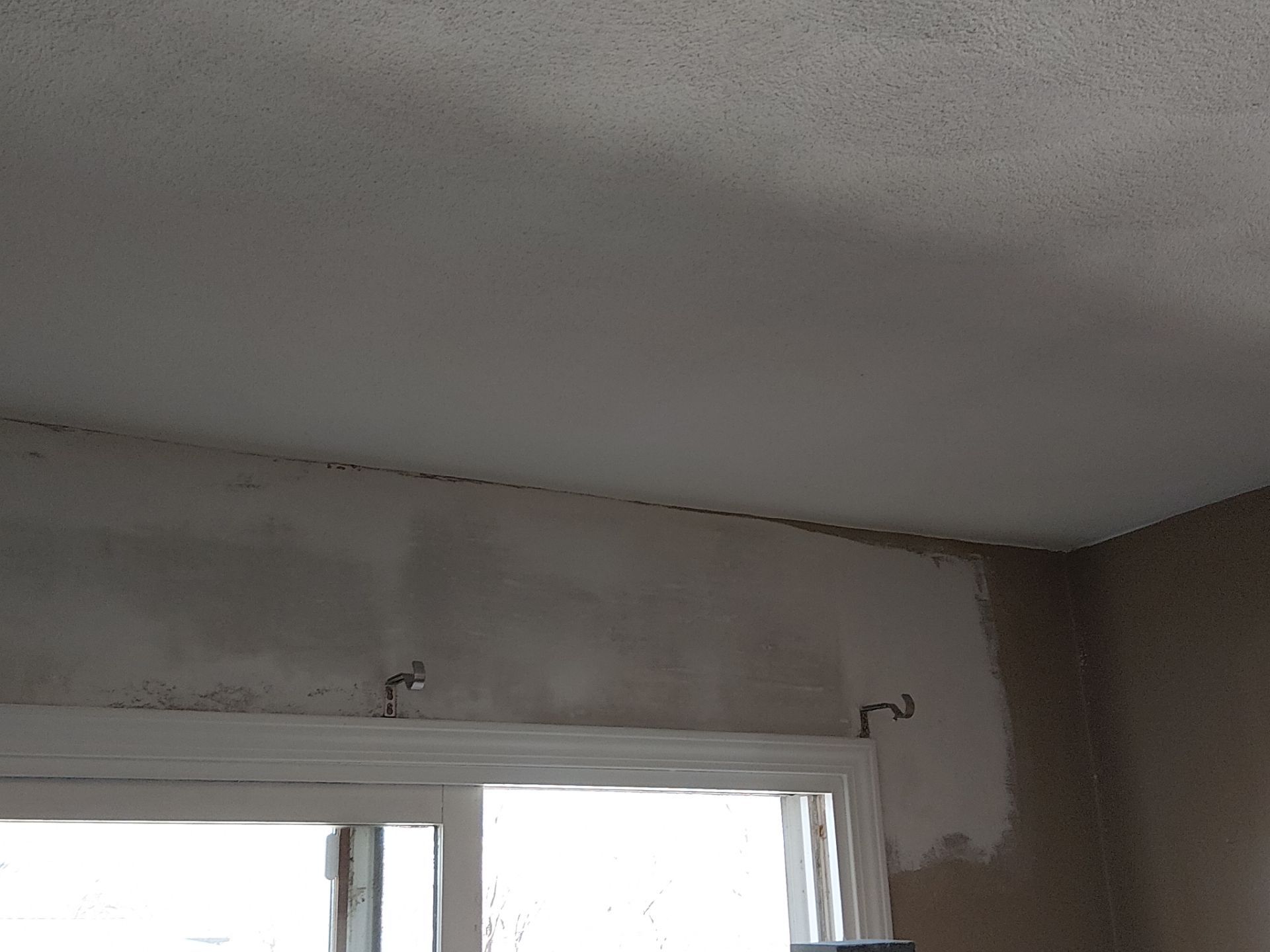 Drywall Repair Above Sliding Door + Seam Repair - Columbia, IL by Legendary Services Company LLC.