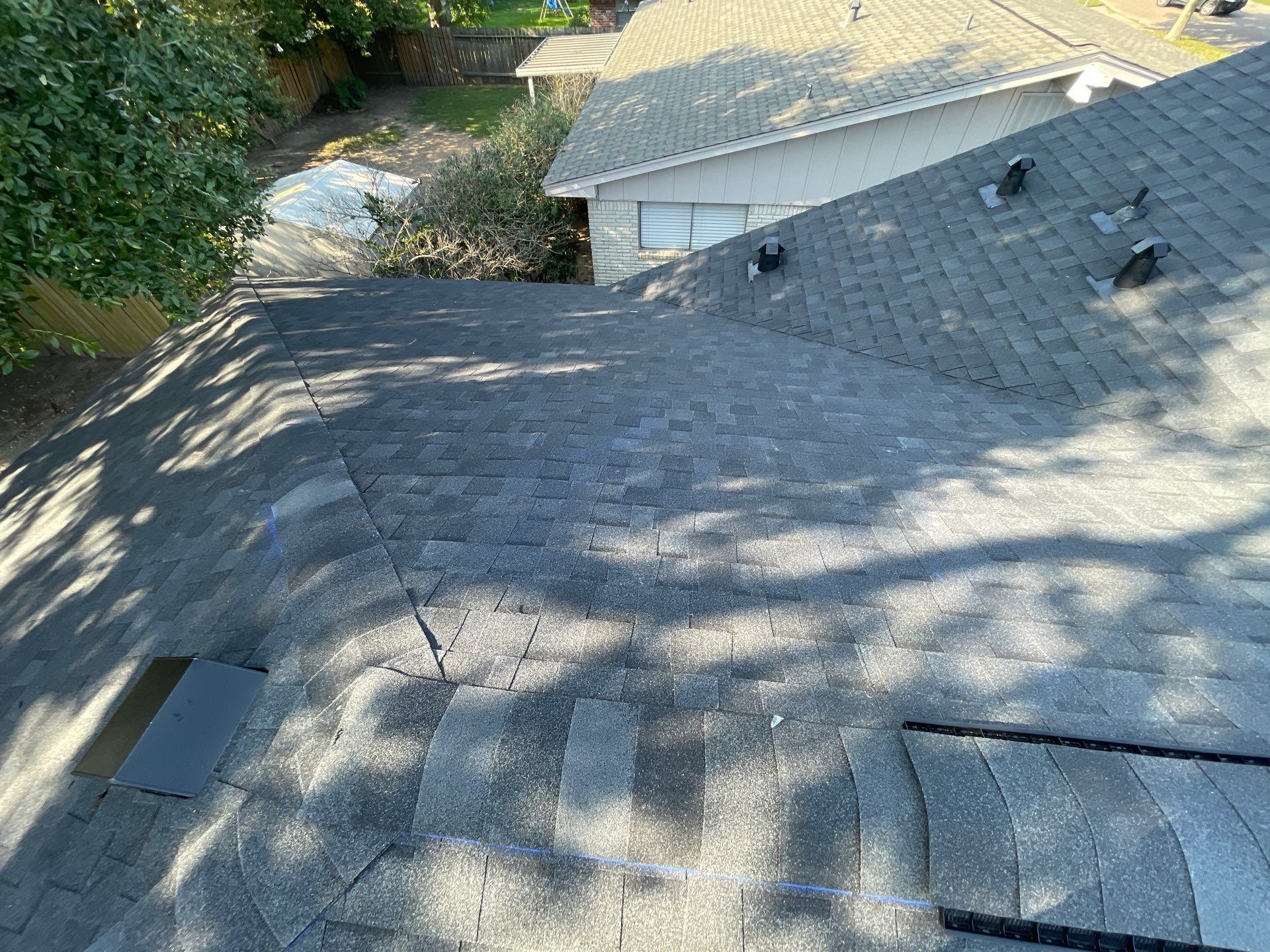 Residential Roofing Installation using Tamko Heritage® Series Rustic Black by CAP Roofing and Construction LLC