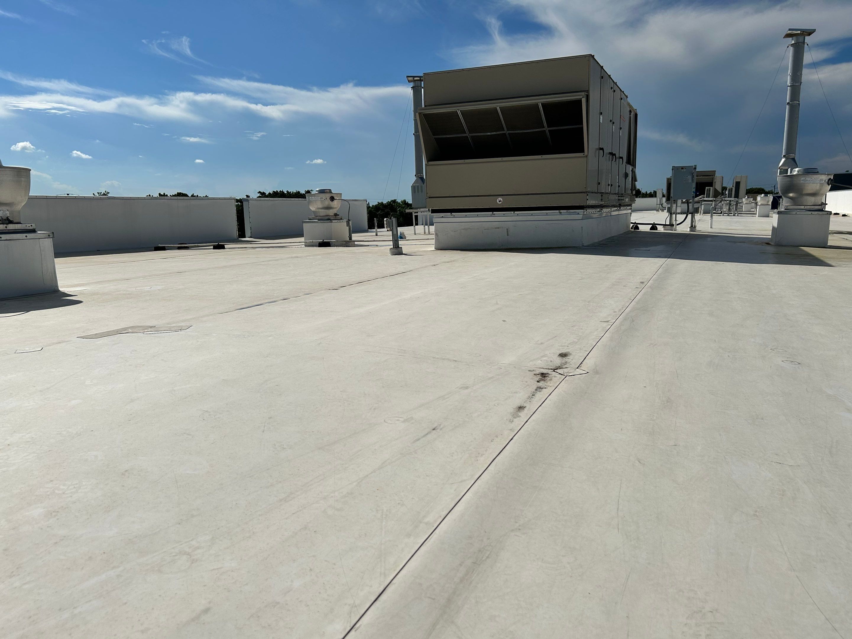 TPO Flat Roof Installation at Dade Quail Roost in Miami by AJF ROOFING INC