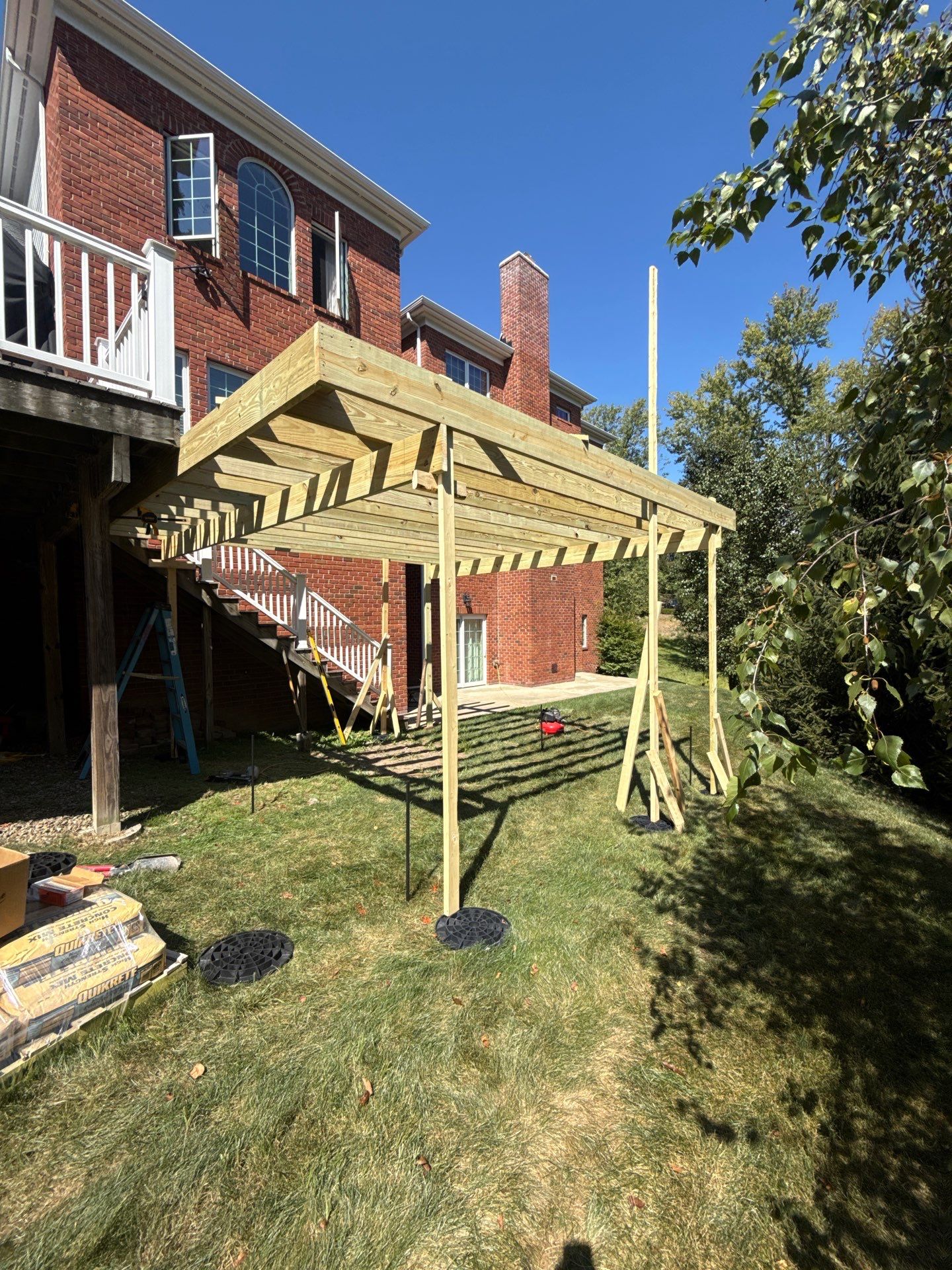 Deck extension  by Cousins Roofing Siding & Decks