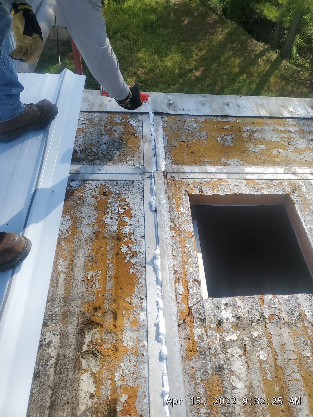 Commercial Roofing Installation using Aluminum Roofing panels by Hostetler Roofing
