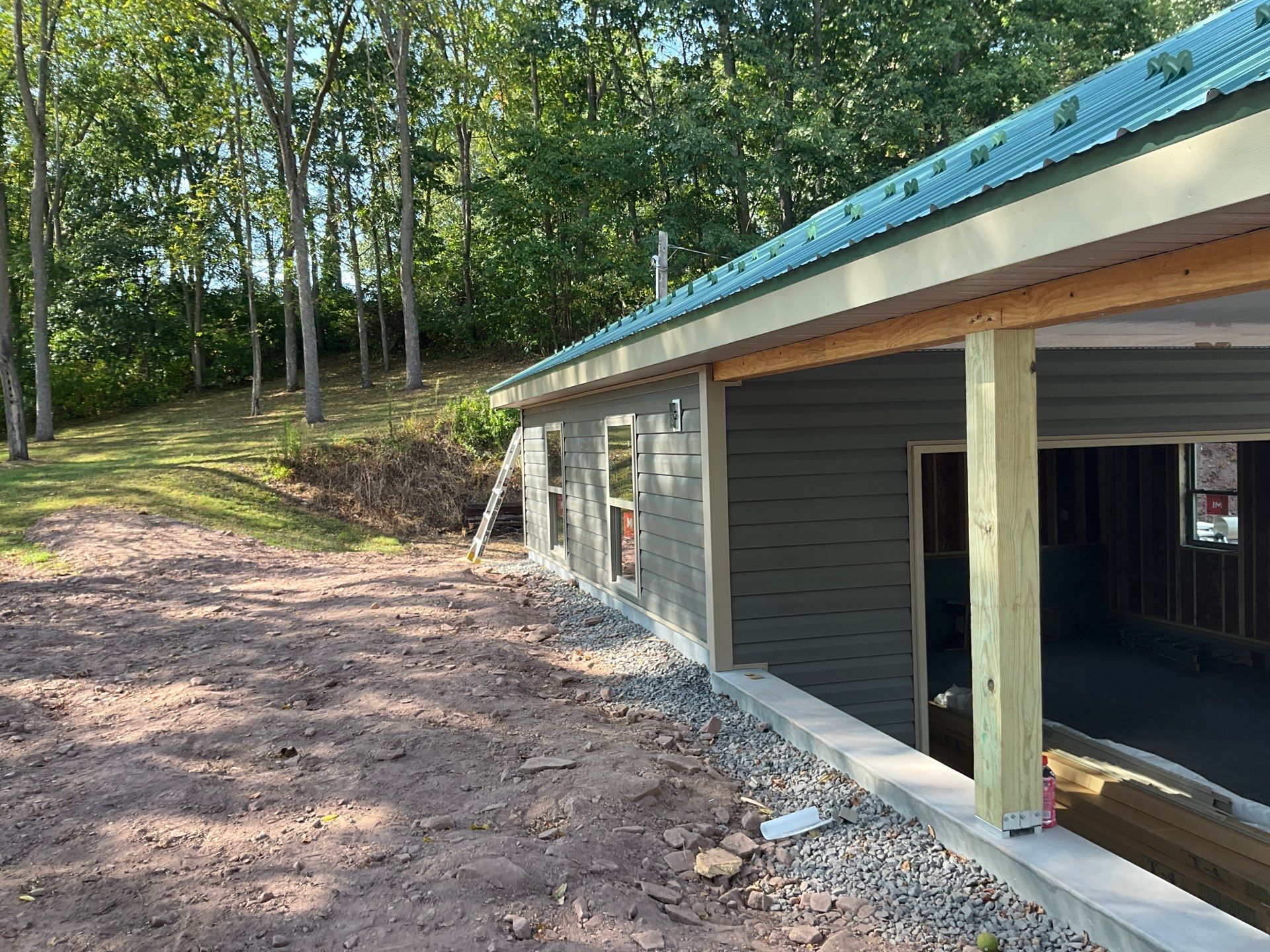 Detached Garage Construction with Vinyl Siding and Metal Roof by Esh Builders