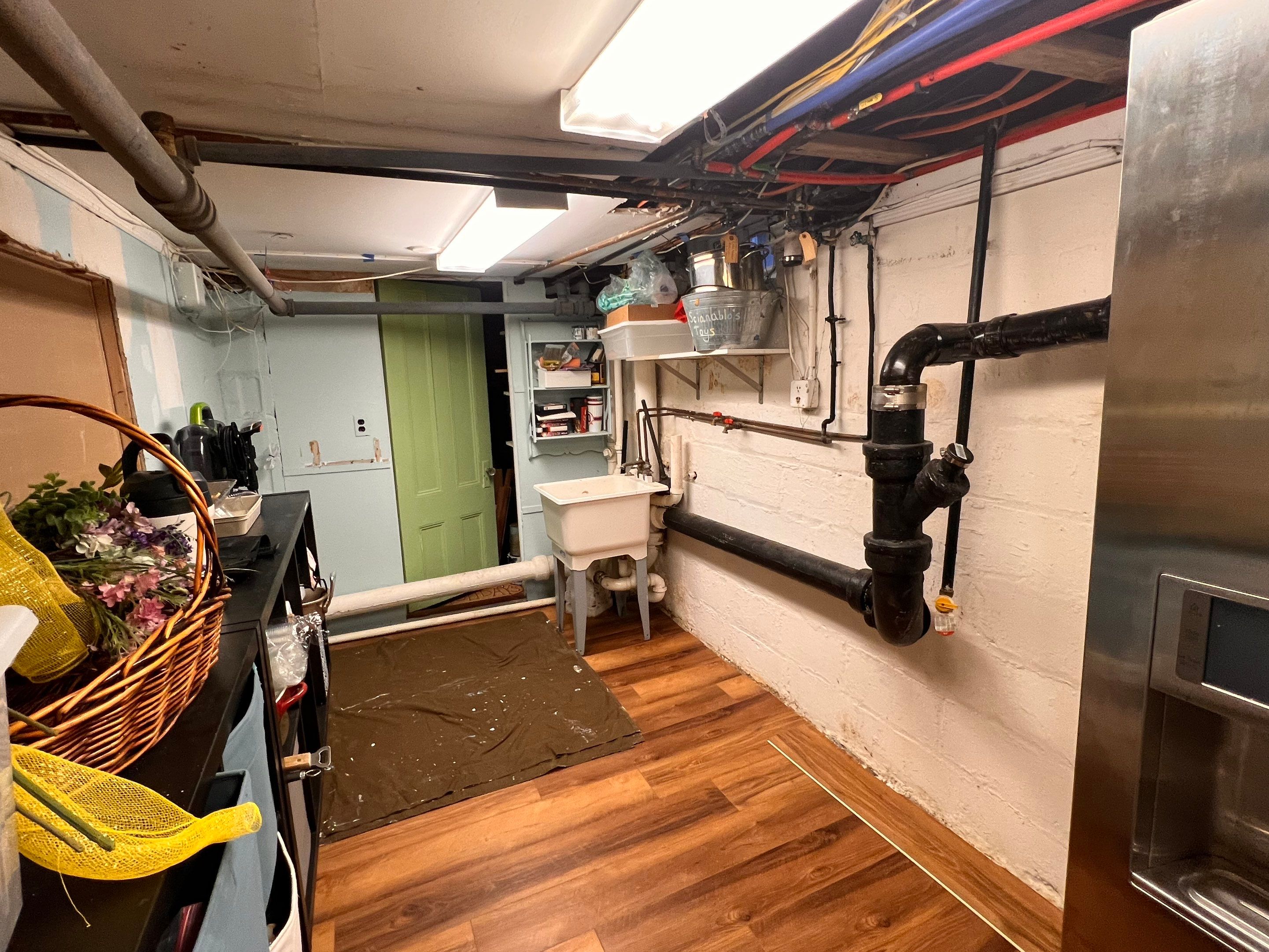 Water Damage Restoration and Finished Basement Flooring in Garden City by EMS Restoration Corp