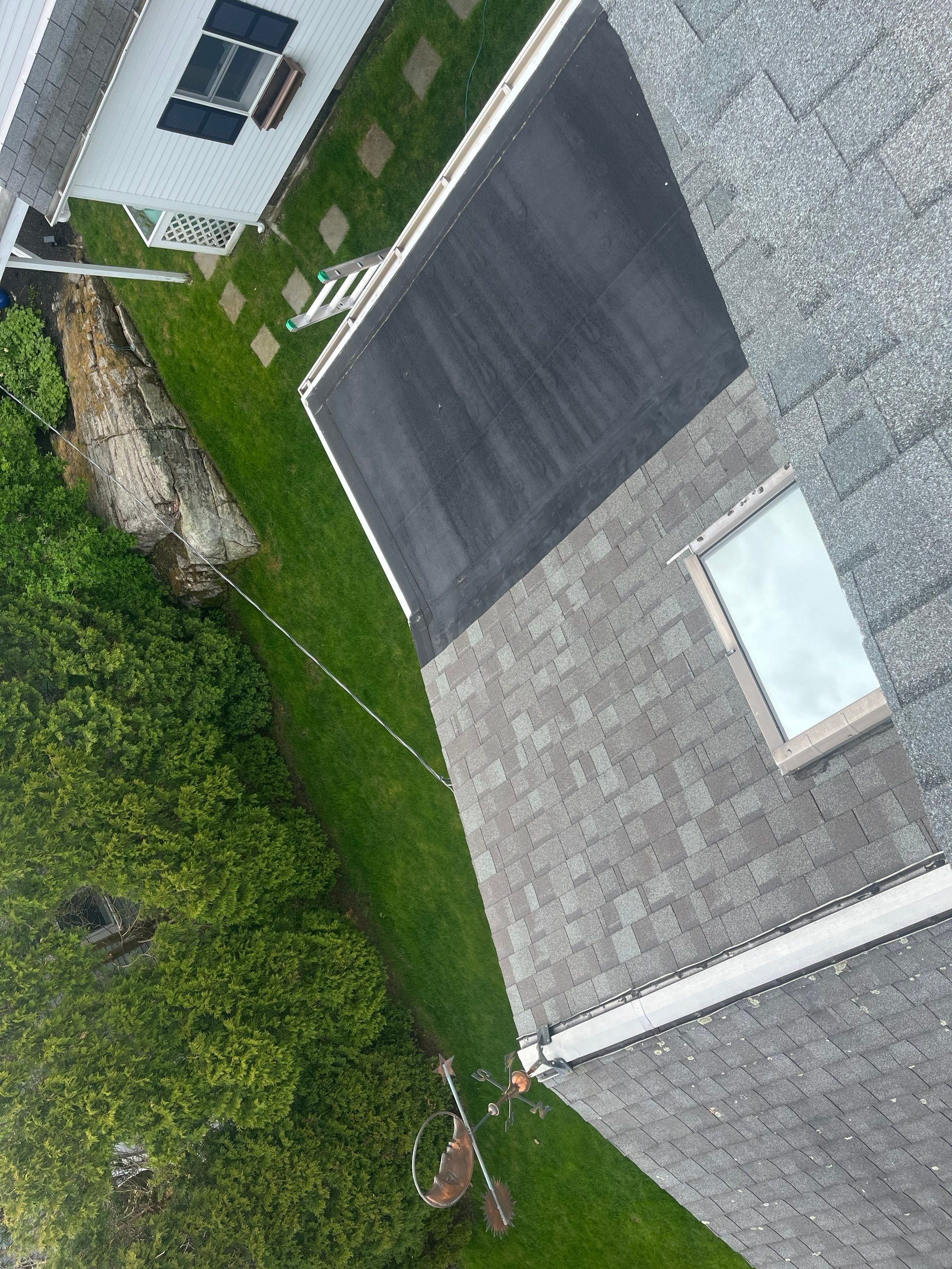 Six Squares of Owens Corning Shingles, and a Velux Skylight in New Castle, NH by Tall pine roofing
