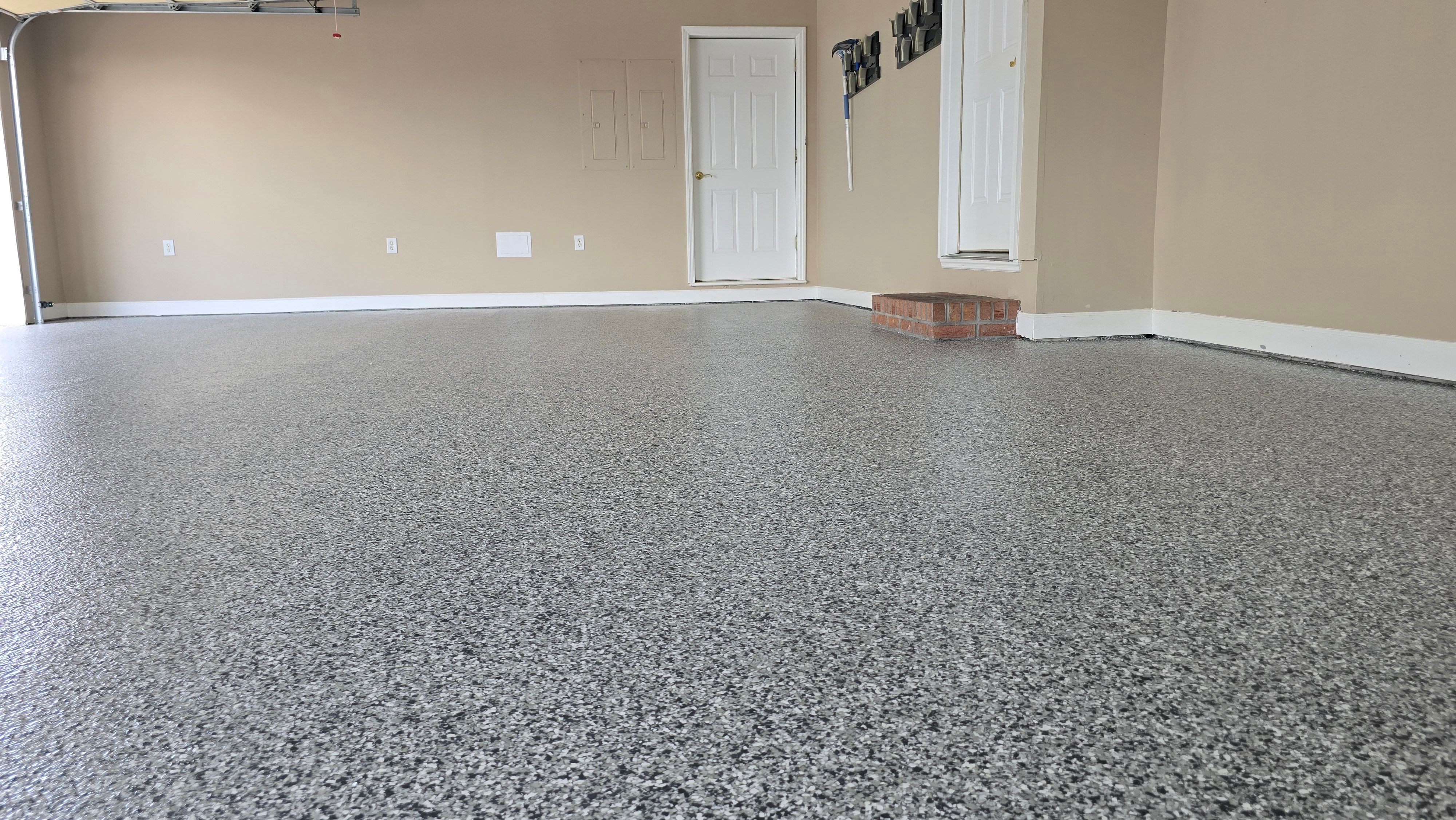 Garage using Gravel by Elite Floor Solutions