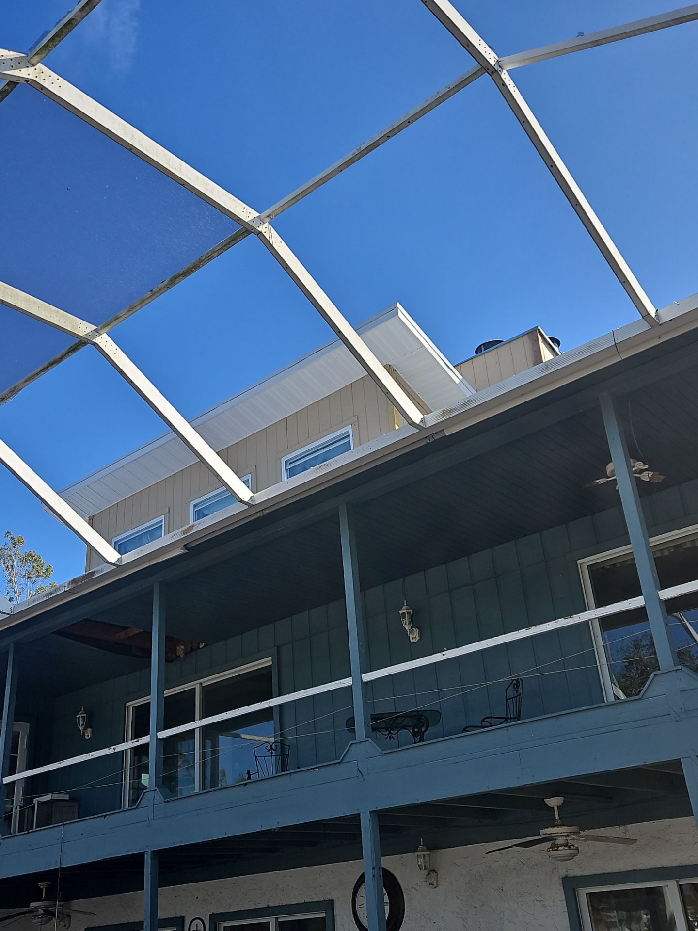 K-Style Seamless Gutter Installation using White Seamless Gutters in Sarasota FL by Gutter Professors