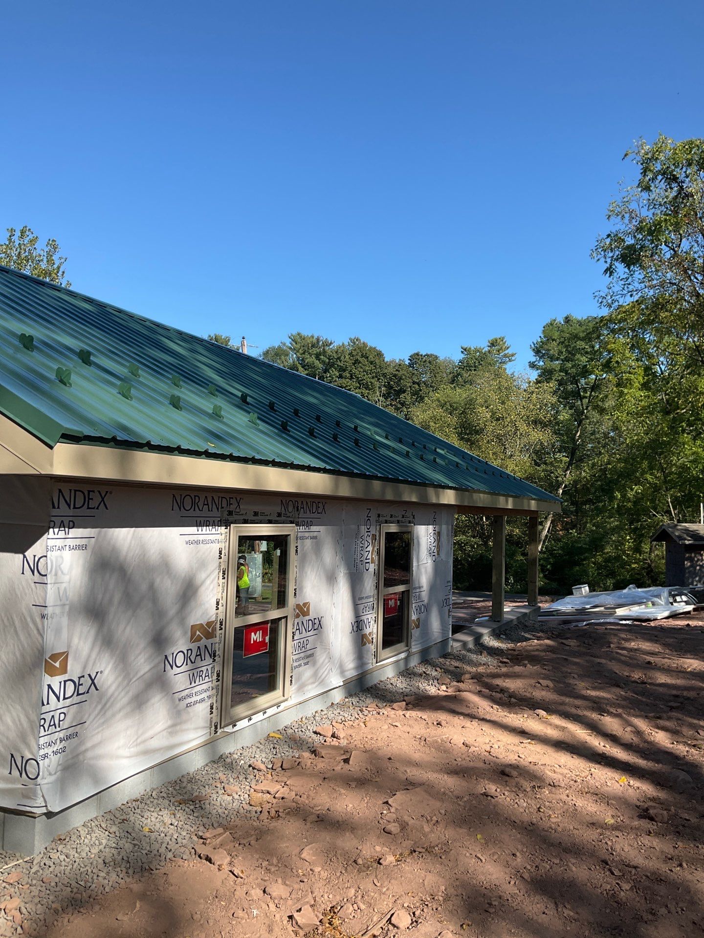 Detached Garage Construction with Vinyl Siding and Metal Roof by Esh Builders