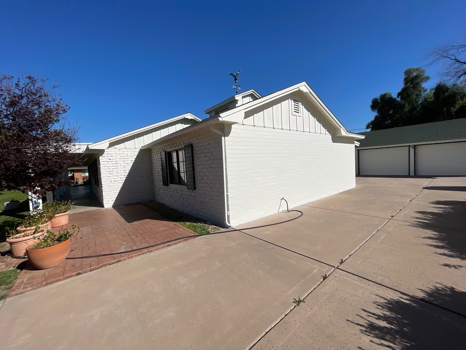 Wagon Wheel - A Stunning Home Exterior Makeover with Dunn Edwards Paints in Phoenix, AZ by Double G Painting Contractors, LLC