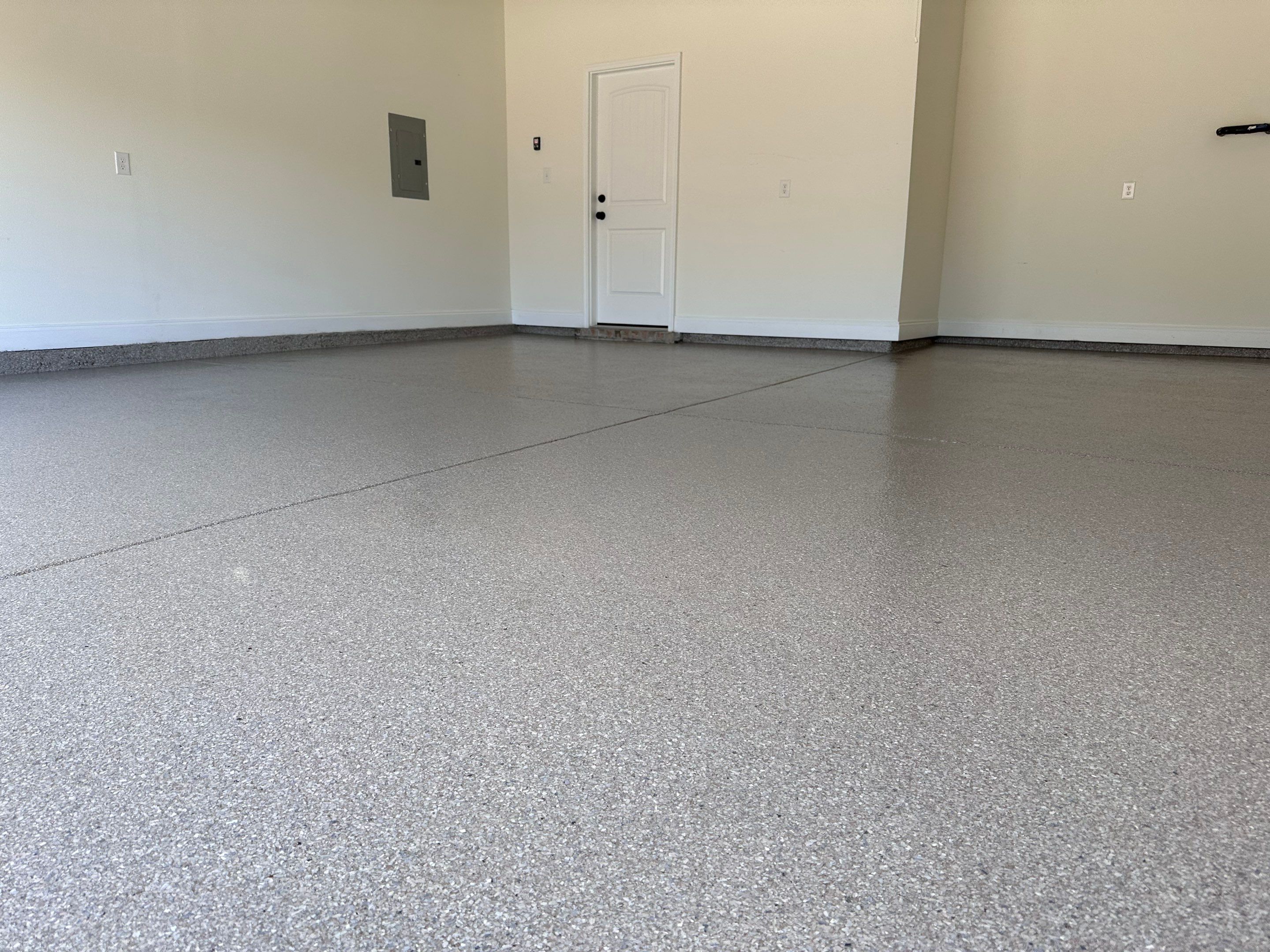 Epoxy Flake Garage and Patio Floor Coating in Cantonment, FL by Cornerstone Hard Surface Restoration 
