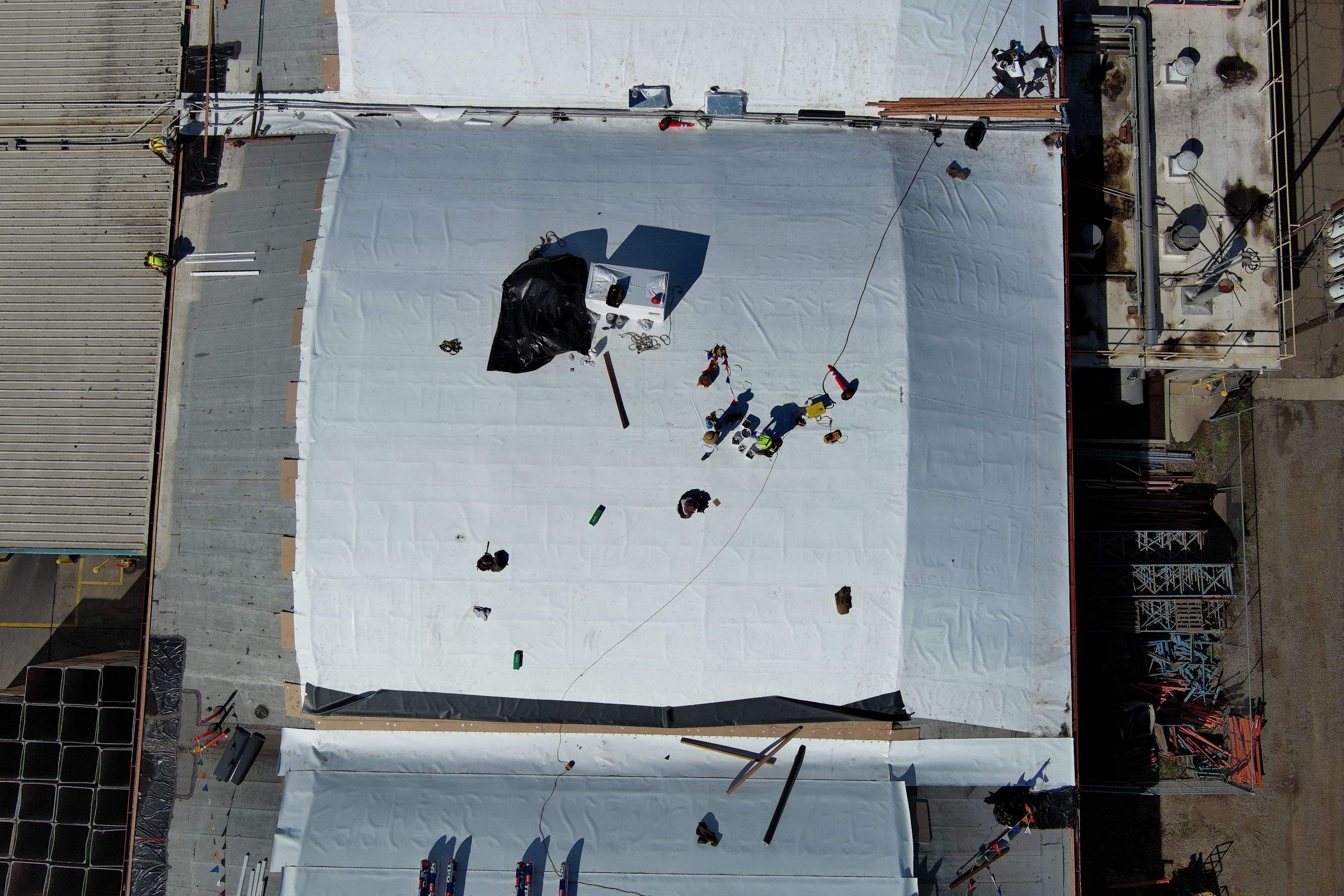 TPO single-ply roofing system using GAF Single-ply TPO 60 mil with 1.5 inch ISO board insulation by Straight Edge Roofing Inc