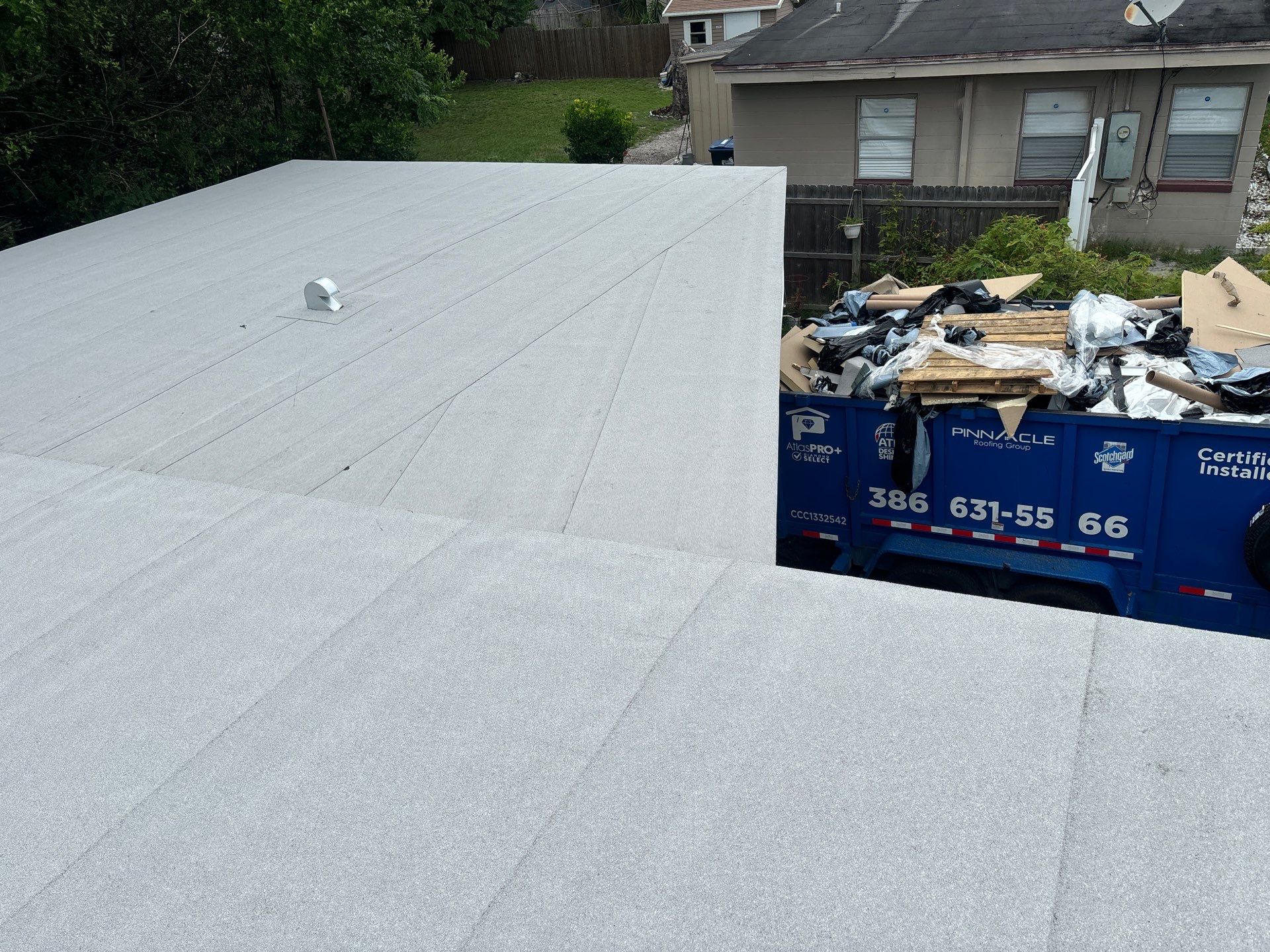 Flat Reroof Replacement Orlando FL by Pinnacle Roofing Group