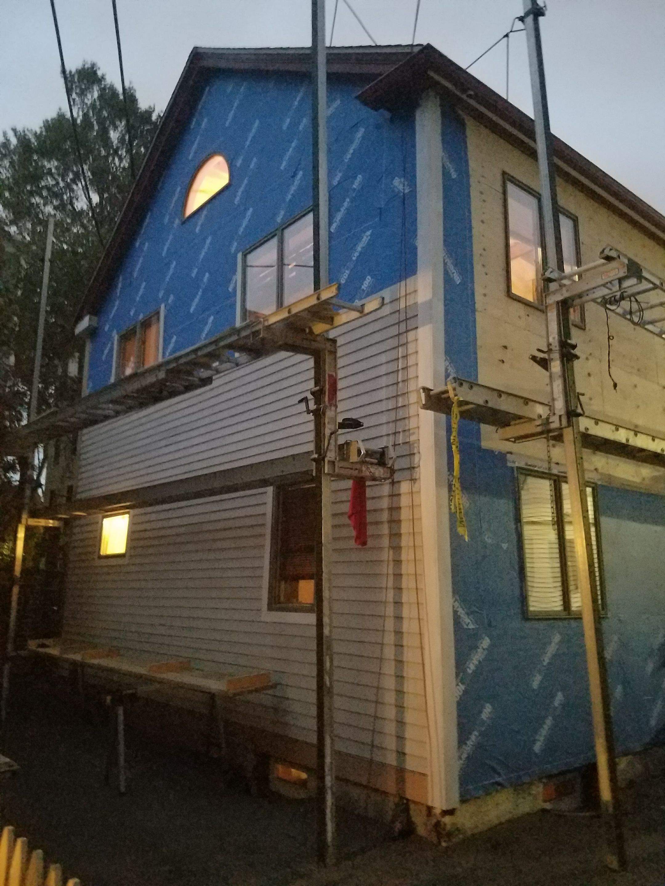 Siding Installation using Cedar Clapboard by Loyalty Exterior Solutions 