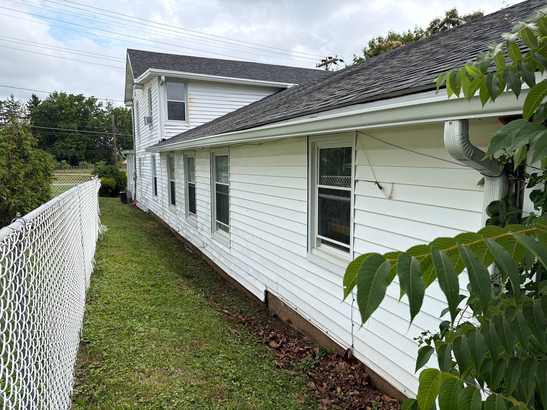 Whole-Property House Washing for Vinyl Siding and Stone Accents in Sykesville by Baltimore Pressure Washers Inc.