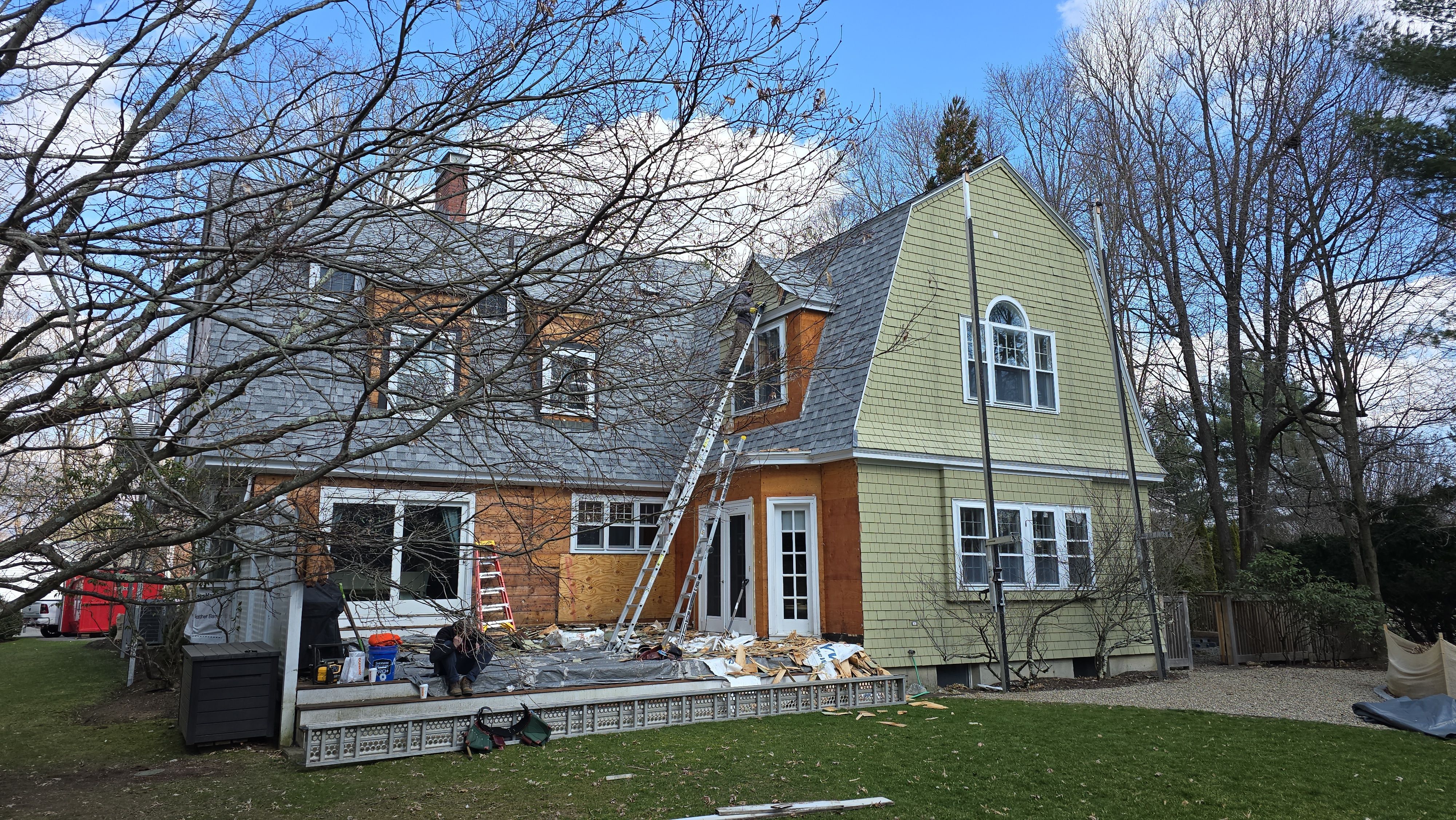 White cedar shingles and windows in Wayland, MA by UBrothers Construction