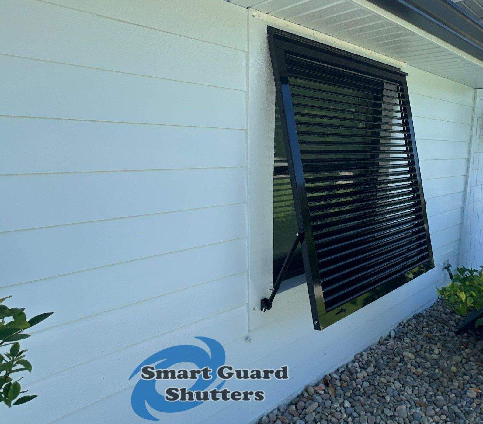 Impact Bahama Shutters in Jet Black by Smart Guard Shutters