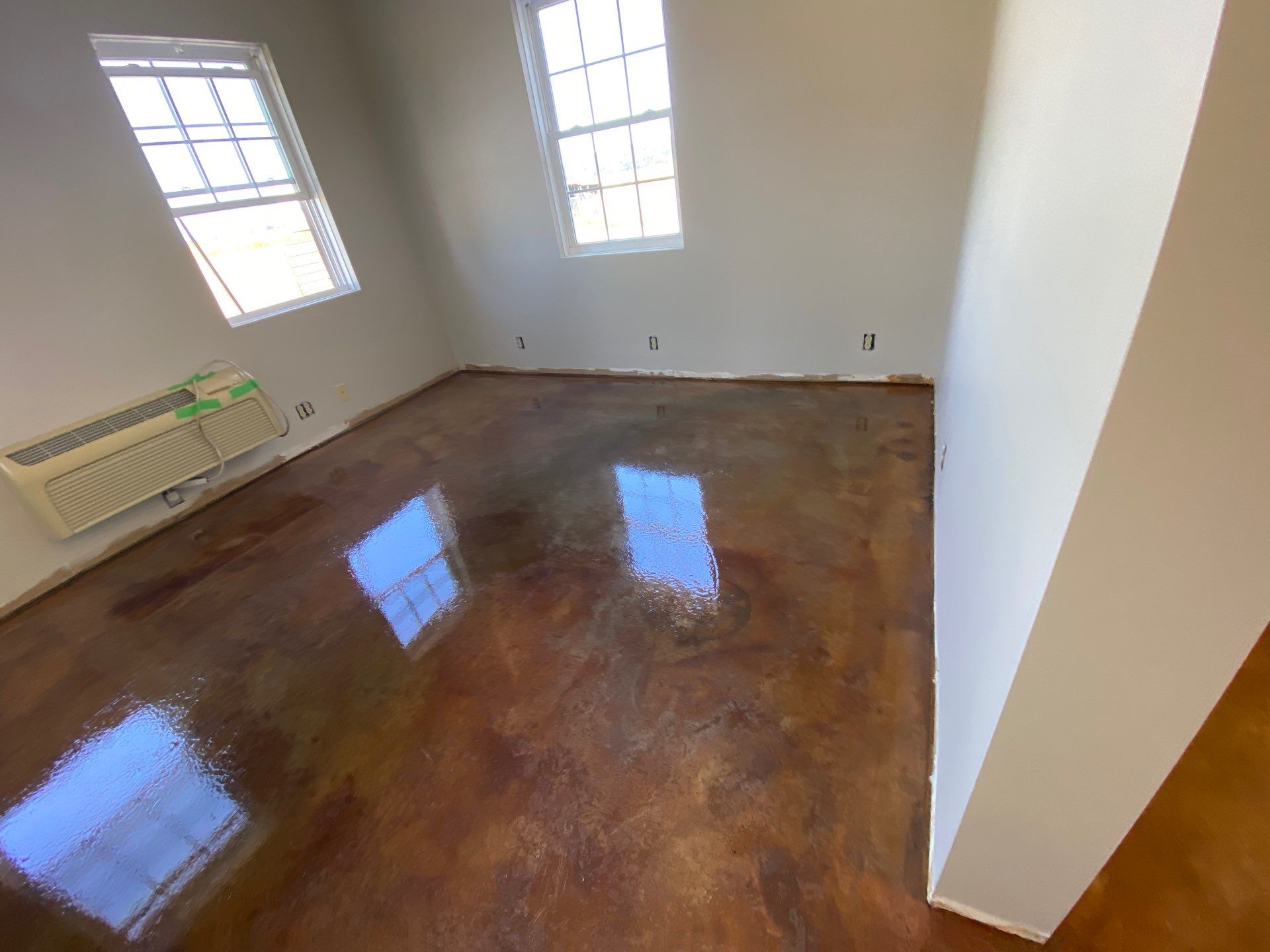 Resealed Concrete floors by Duncan Painting And Wallcovering