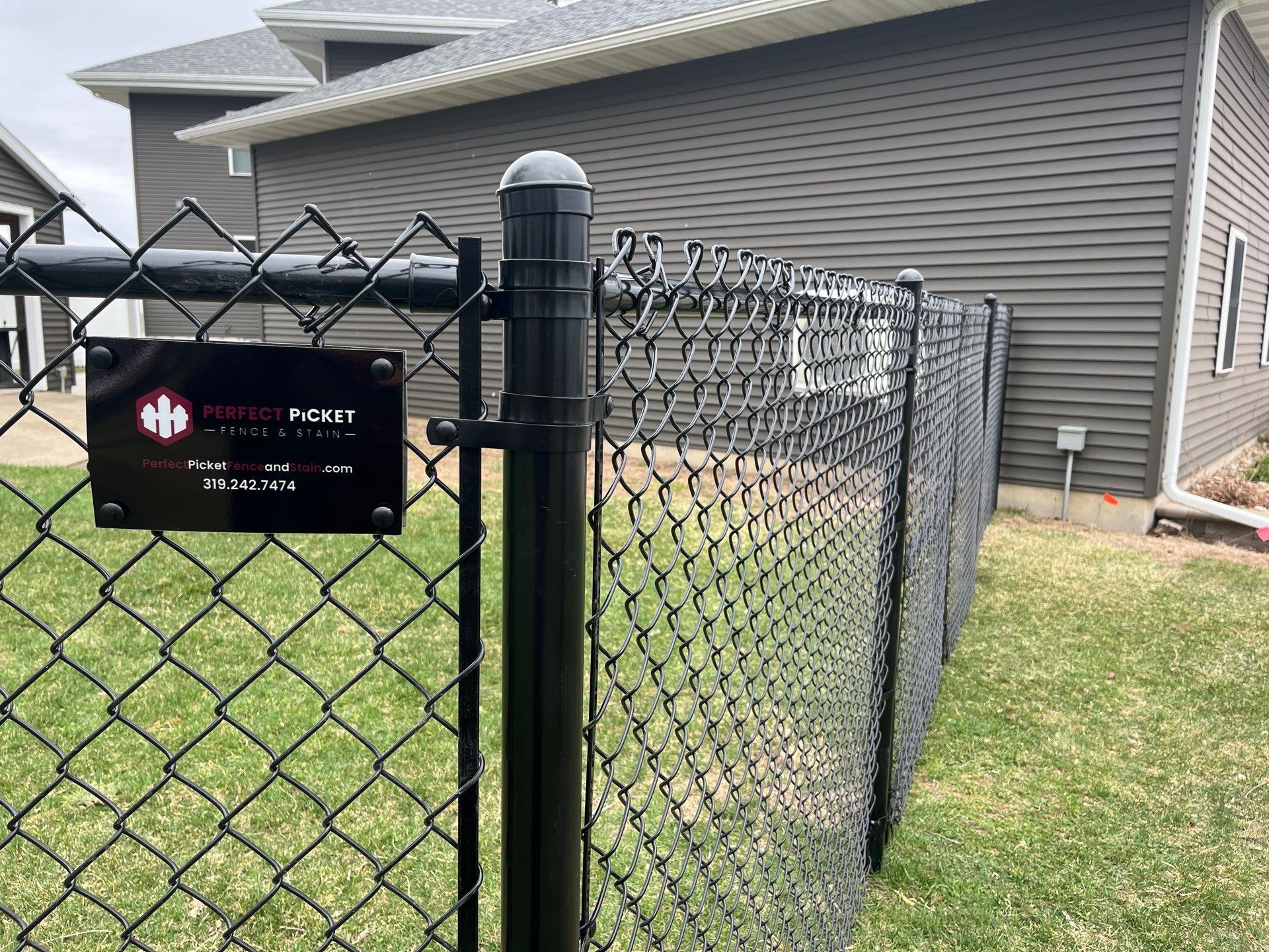 White Vinyl Privacy and Black Chain Link Fencing in Buckingham by Perfect Picket Fence and Stain