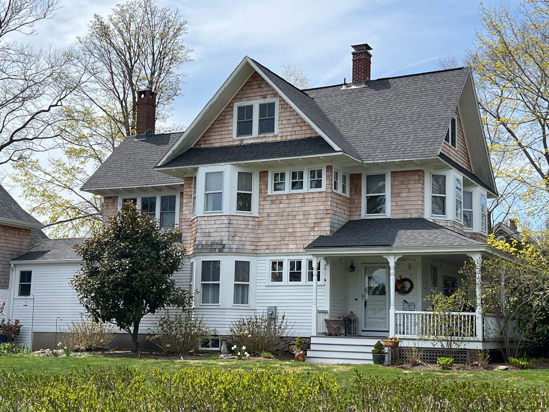 Pewterwood Roofs by Pinnacle Roofing & Skylights