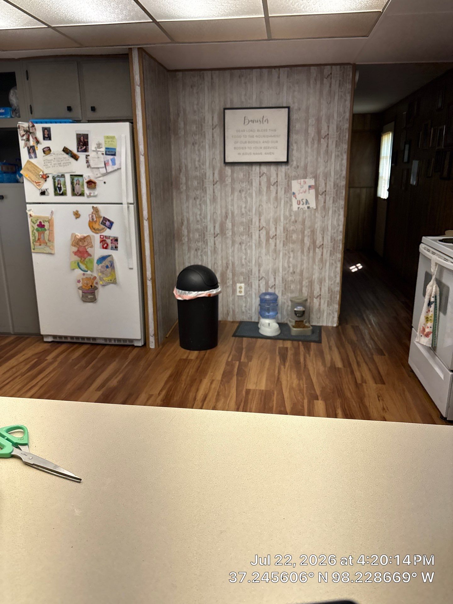 Kitchen Renovation Featuring Grey Cabinetry and Laminate Flooring in Attica by CompanyCam Sales Demo
