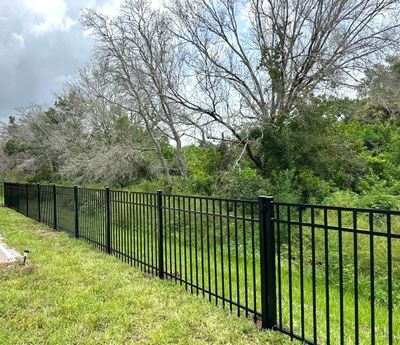 Aluminum Fence Installation using Aluminum Fence and Vinyl Privacy Fence