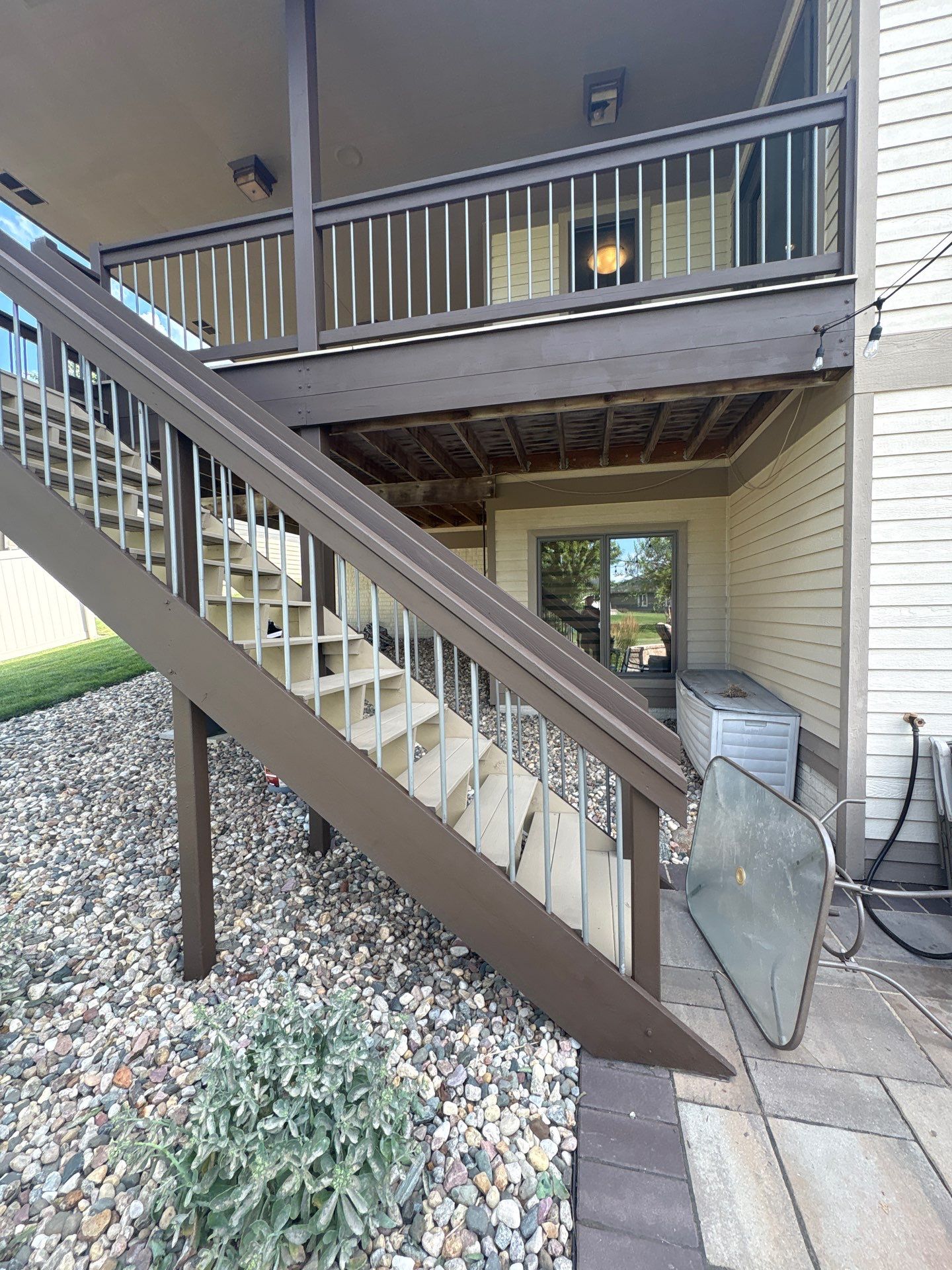 Sioux Falls Exterior Refresh and Multi-Level Deck Maintenance by Select Painting, Coatings & Garage Cabinets