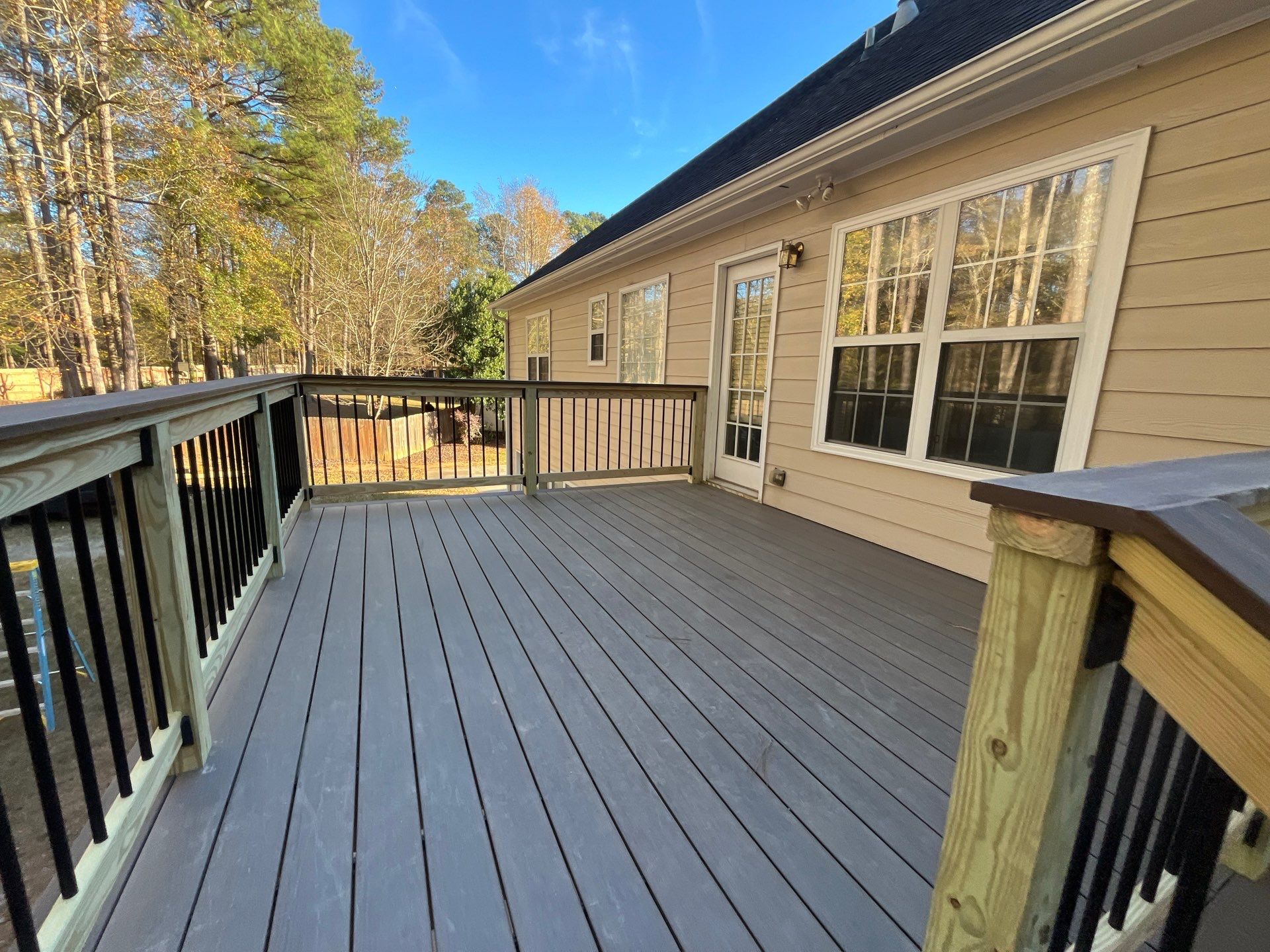 Deck Build using Deckorators Venture Series Decking in the Sandbar Color by Nelson Exteriors