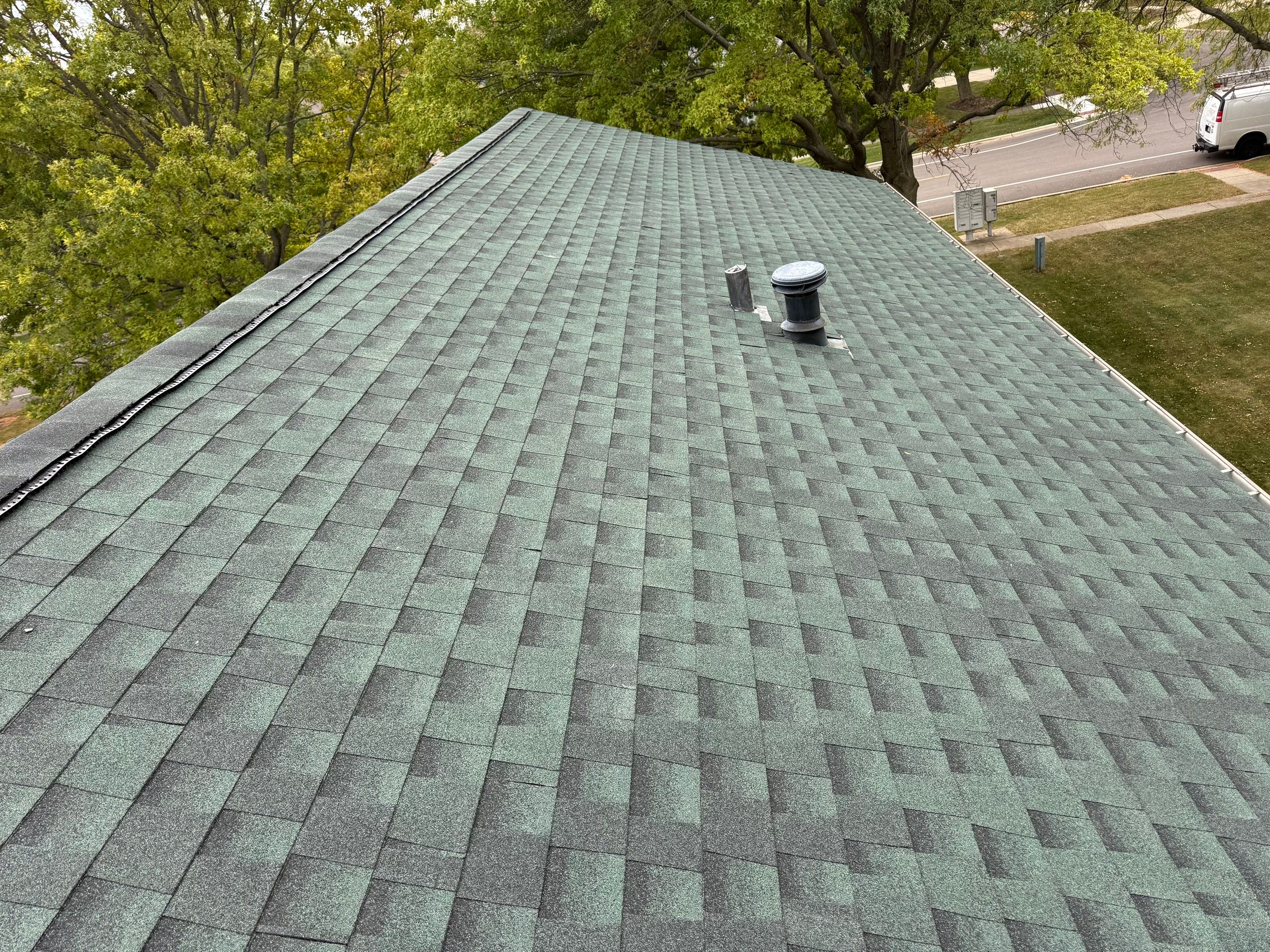 Roof & gutters by Optimal Home Improvement 