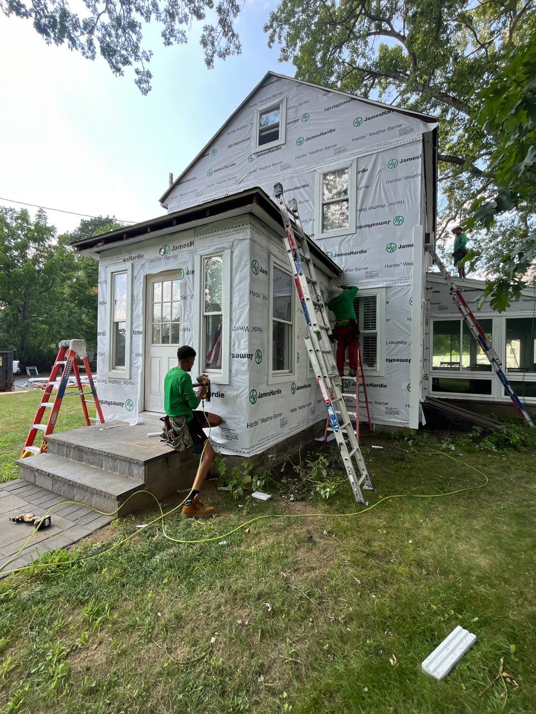 James Hardie Lap Siding Installation in Chelmsford, MA by Mighty Dog Roofing of Greater Middlesex County