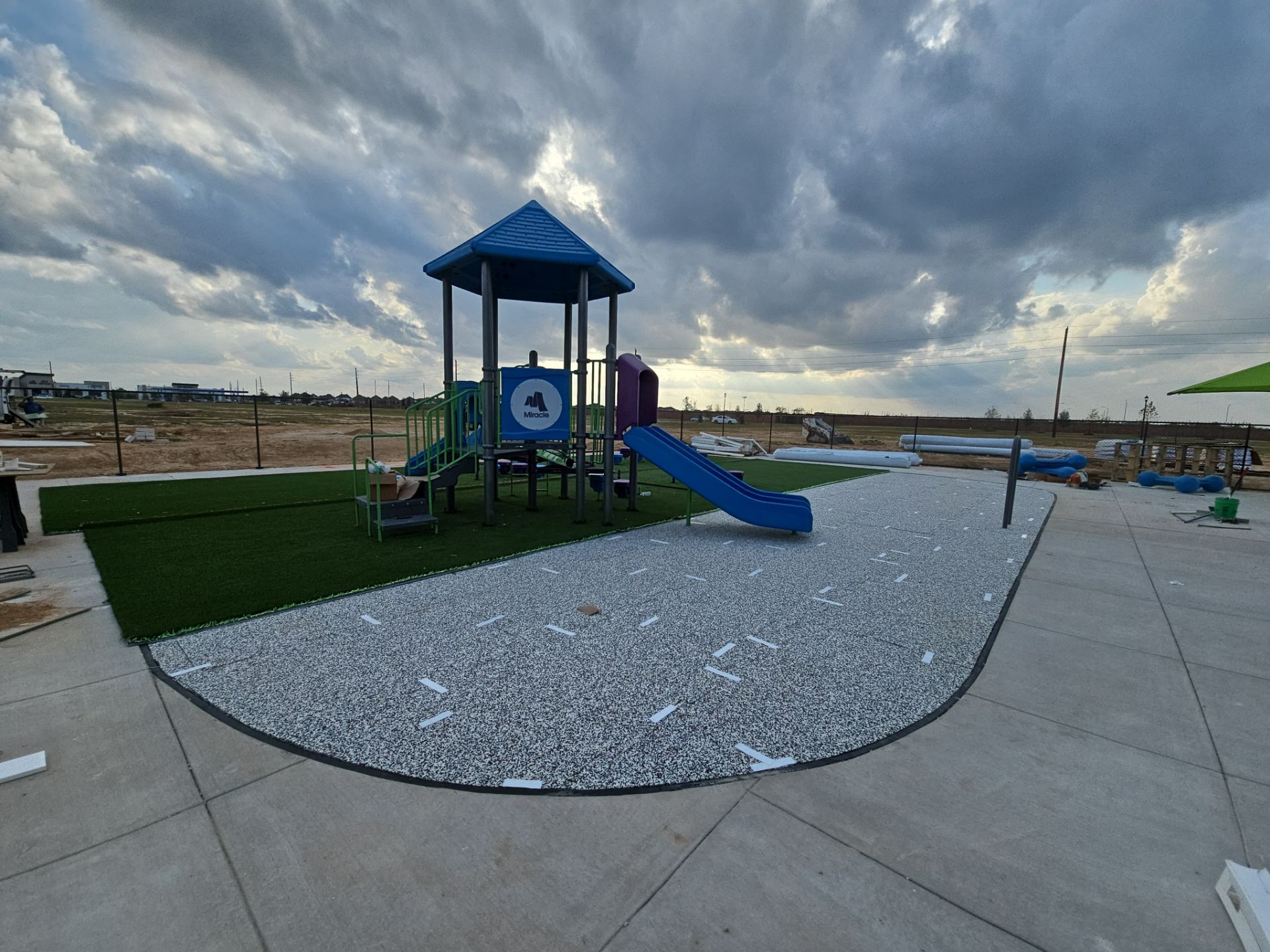 Everbook Sunterra Playground Equipment & Turf Install by Southwest Greens Midwest