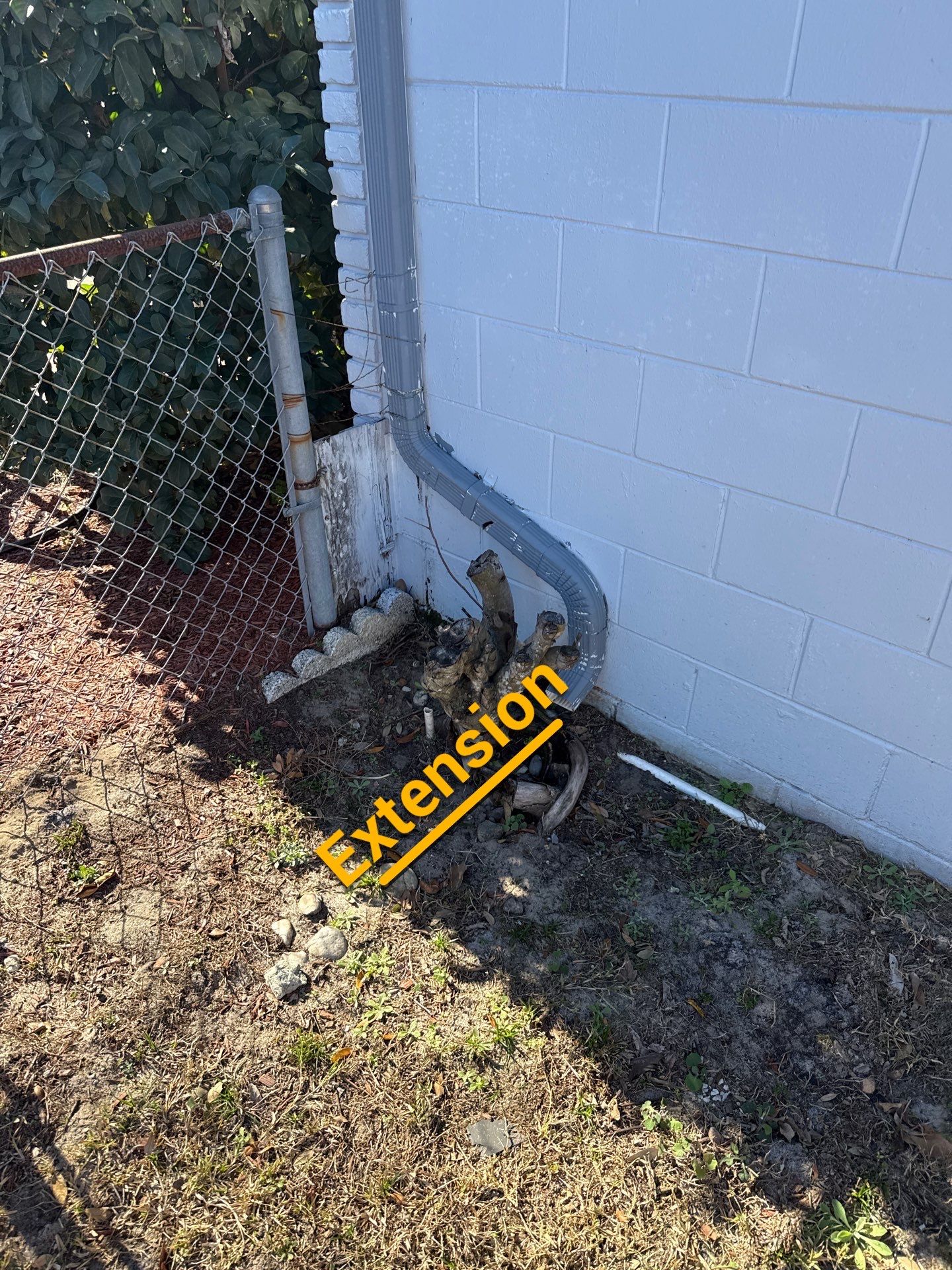 Downspout Installation using Downspout Extension and new Gutters in Winter Haven FL by Gutter Professors