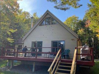 Log Cabin Exterior Restoration and Siding Staining in Readfield by Picture Perfect Pro Painting