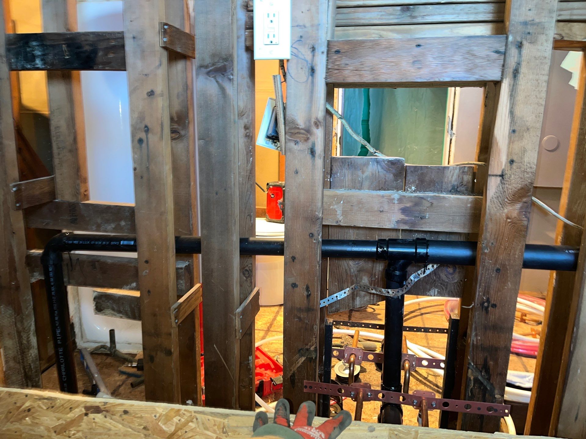 Installing New Piping and Checking Underneath Home by Us Plumbing