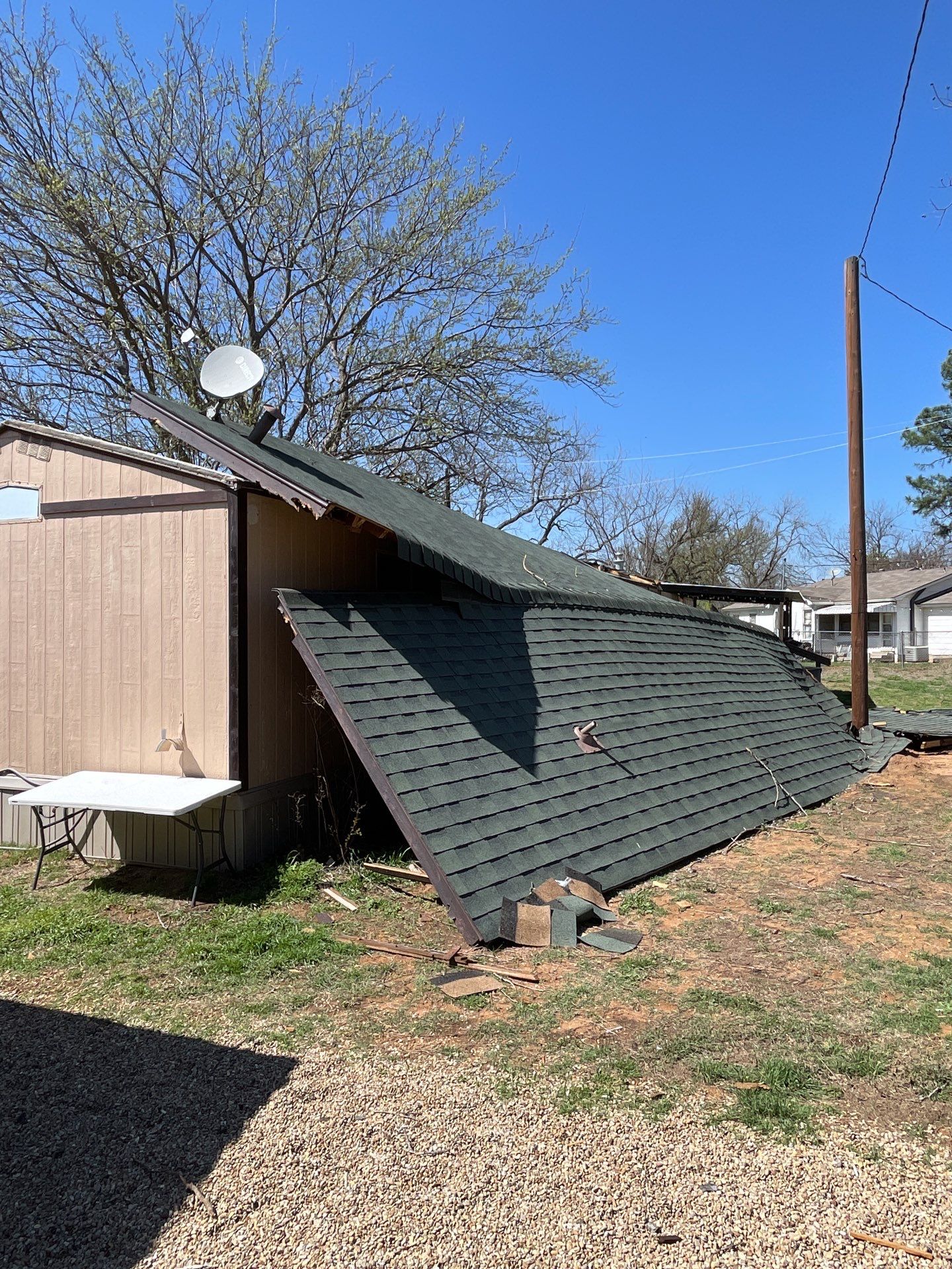 Roof Damage using ATLAS Pinnacle Pristine Shingles by Harvey Roofing & Construction