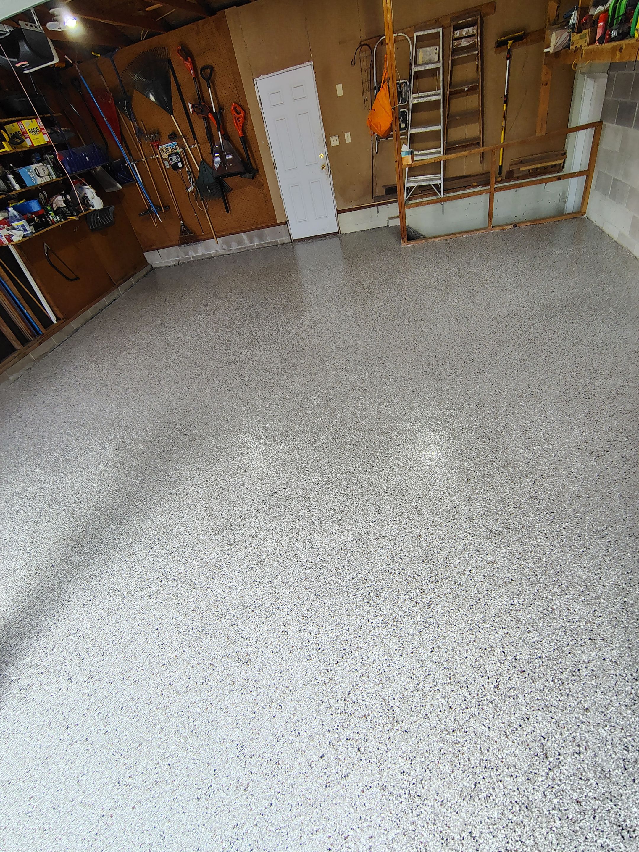 Sioux Falls Garage Epoxy Floor Installation and Concrete Crack Repair by Select Painting, Coatings & Garage Cabinets
