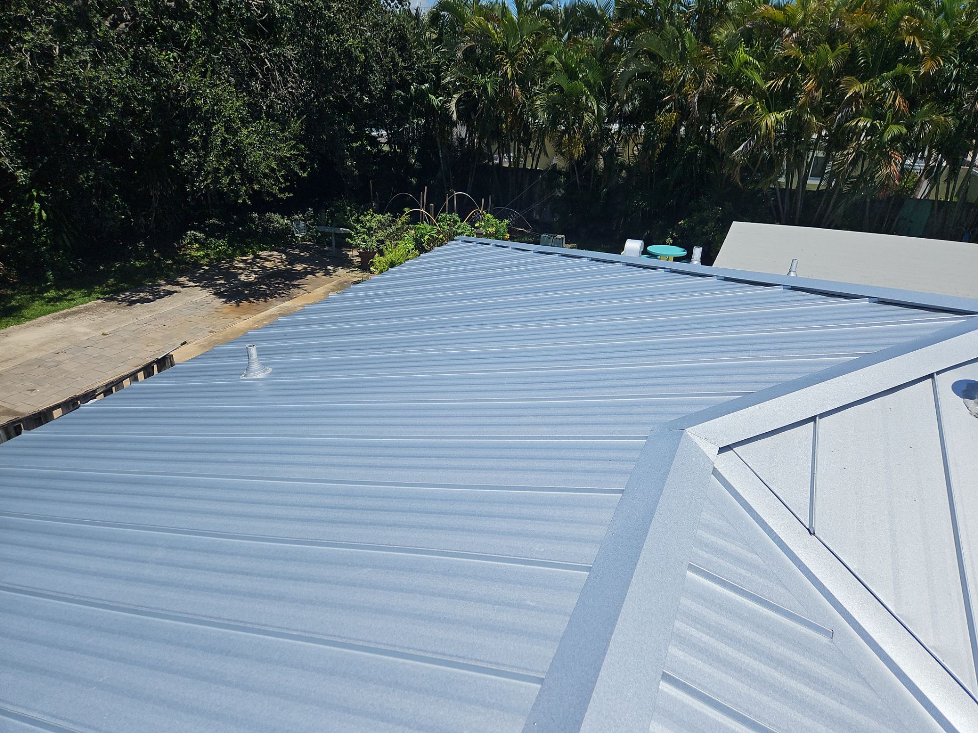 Residential Roofing Installation using 1" Nail strip metal roof by BLUES BROTHERS ROOFING