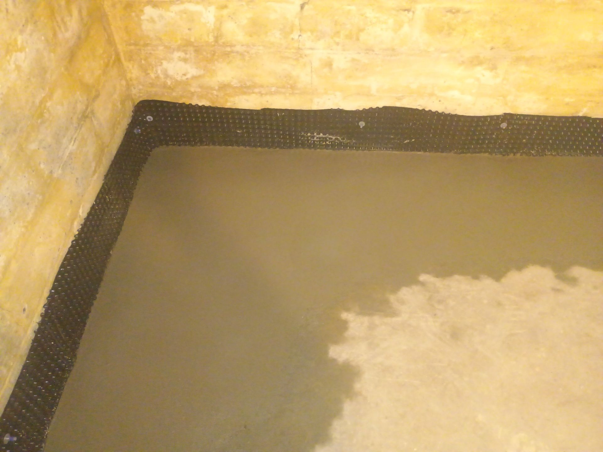 Interior Drain Tile for a South Minneapolis Basement by Waterproofing Northeast