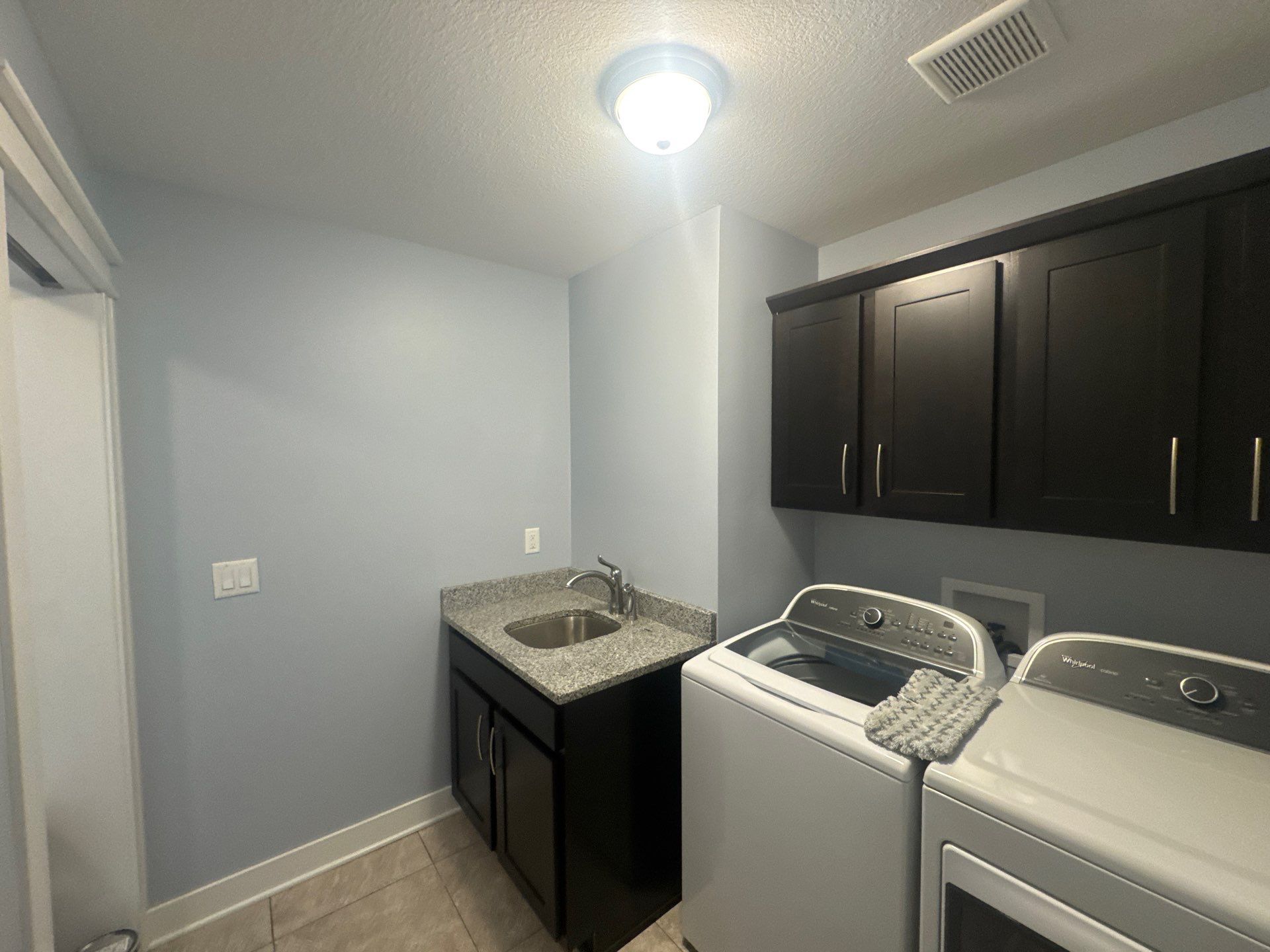 Residential Interior Repaint Color Change on Walls and Cabinets by Midwest Paint LLC