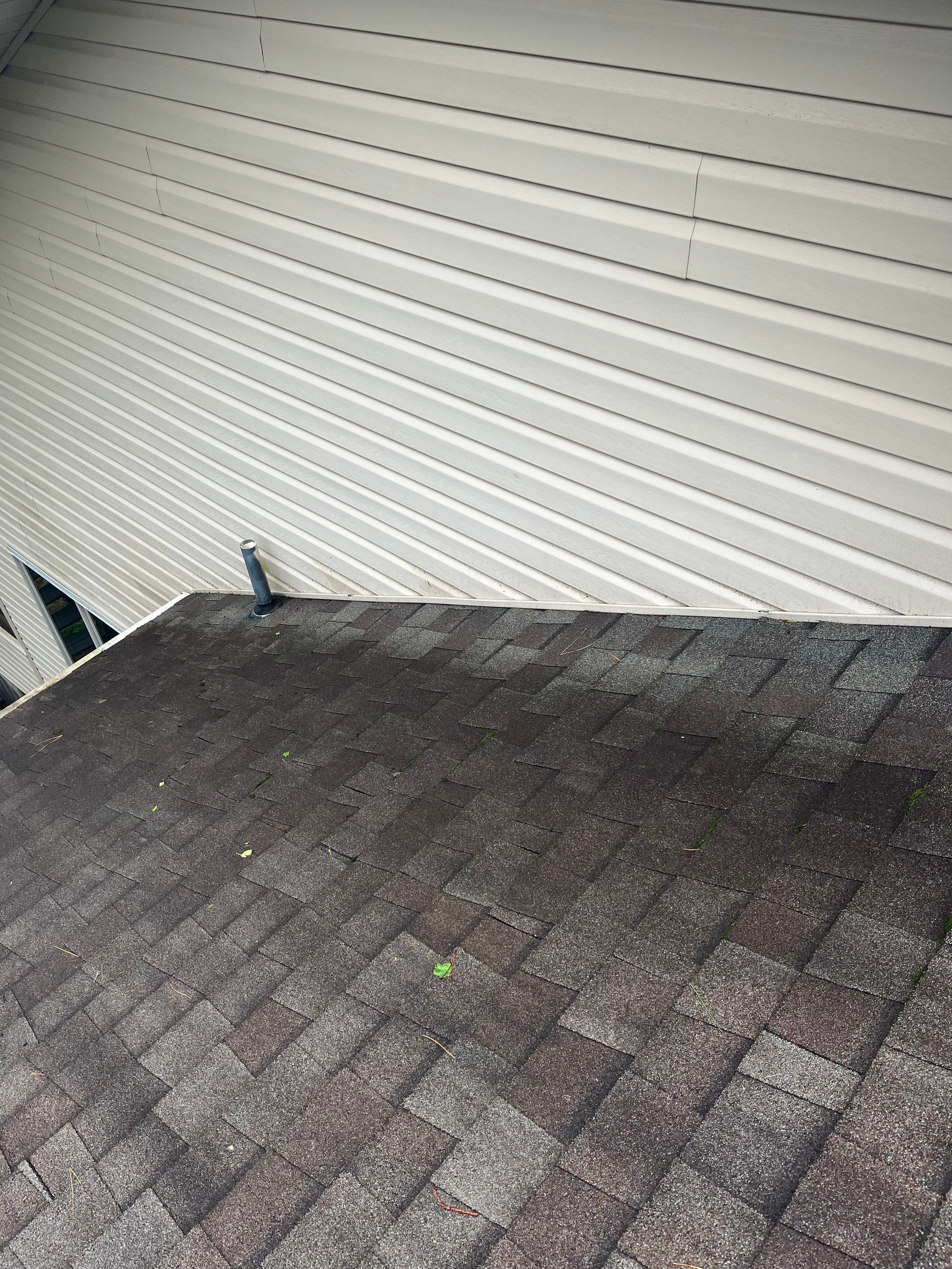 Architectural Shingle Roof Replacement and Skylight Installation in Hot Springs Village by Temple Roofing and Exteriors