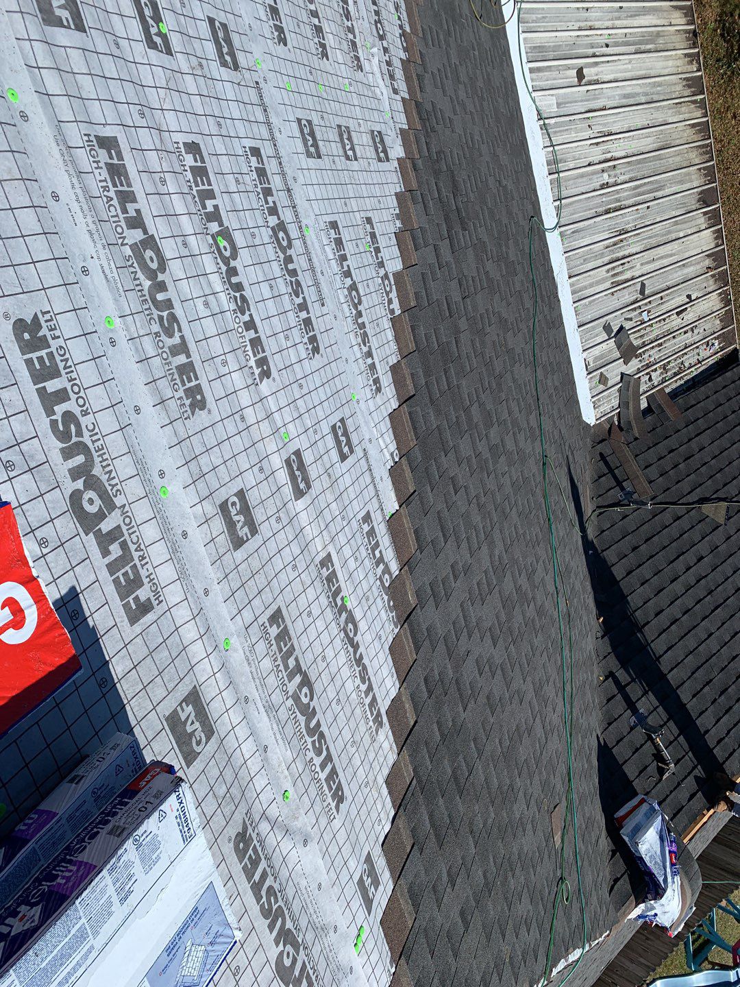 Residential Roofing Installation using Roof Replacement by American Roofing & Construction LLC