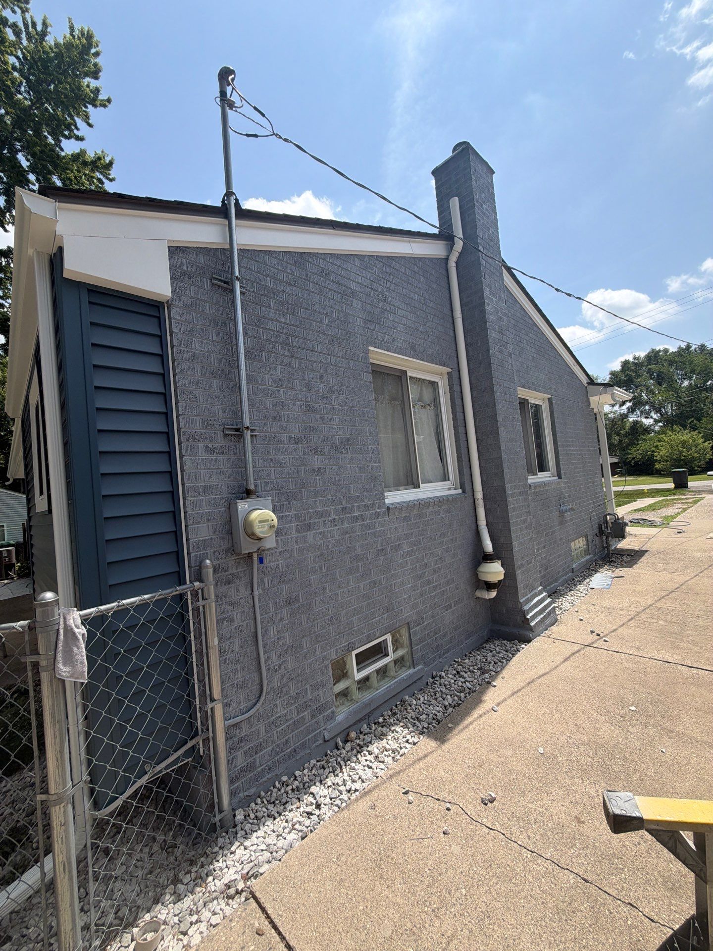 Exterior Brick Staining Transformation by Top Shelf Painter