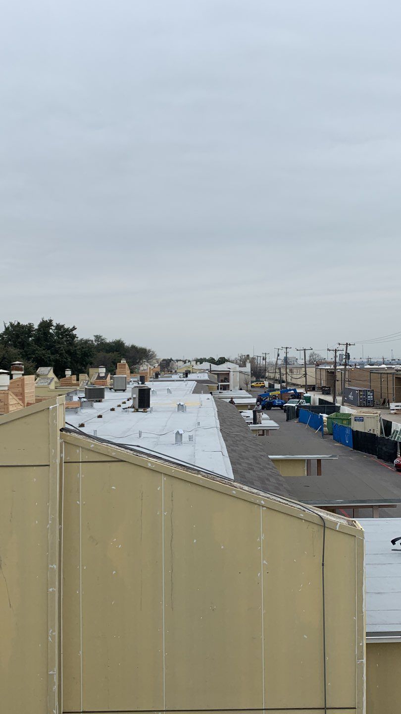 Apartment Roof Replacement by First Out Roofing 