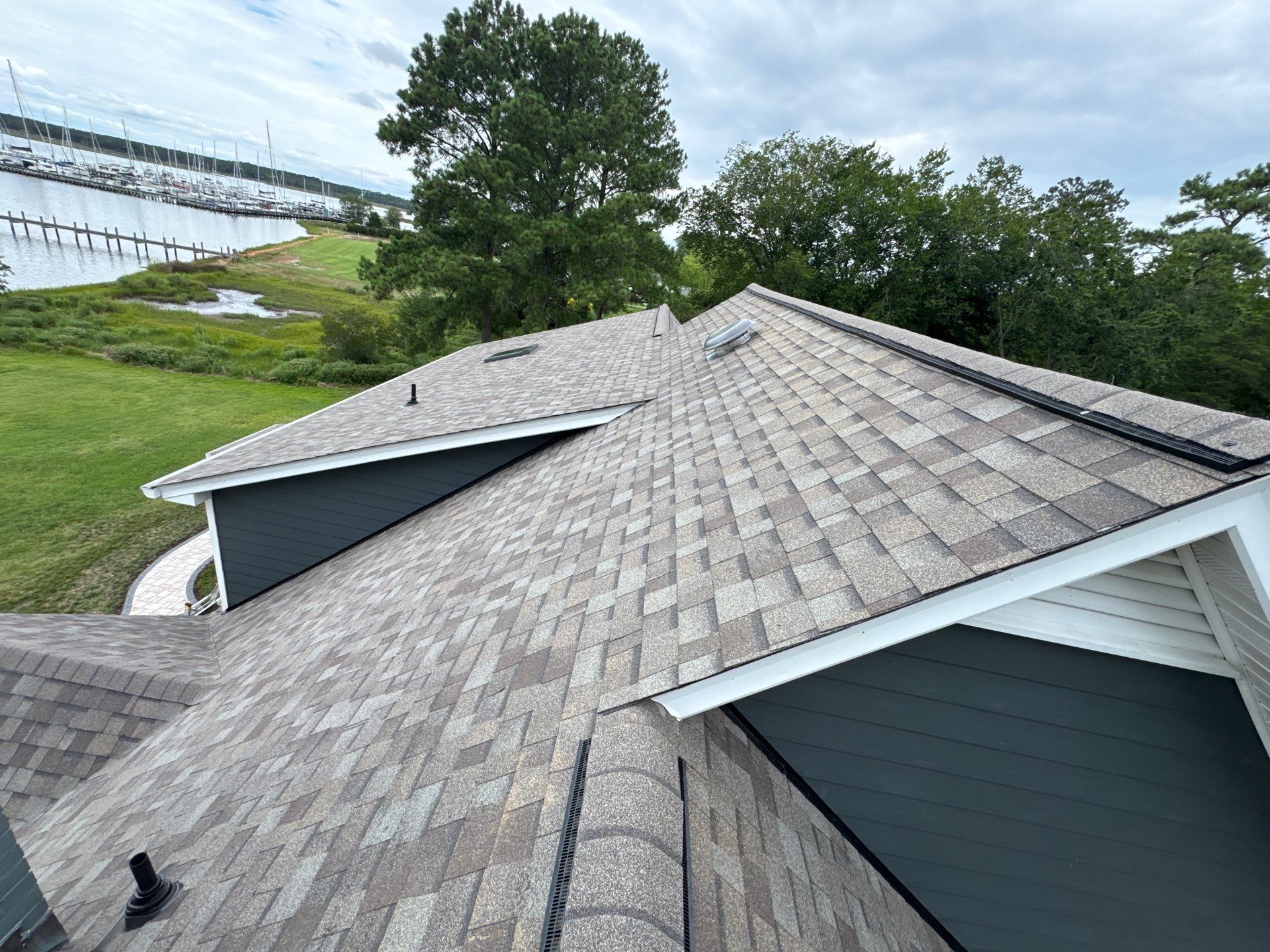 Roof Replacement and White Gutter Installation in Gloucester by Cade Construction