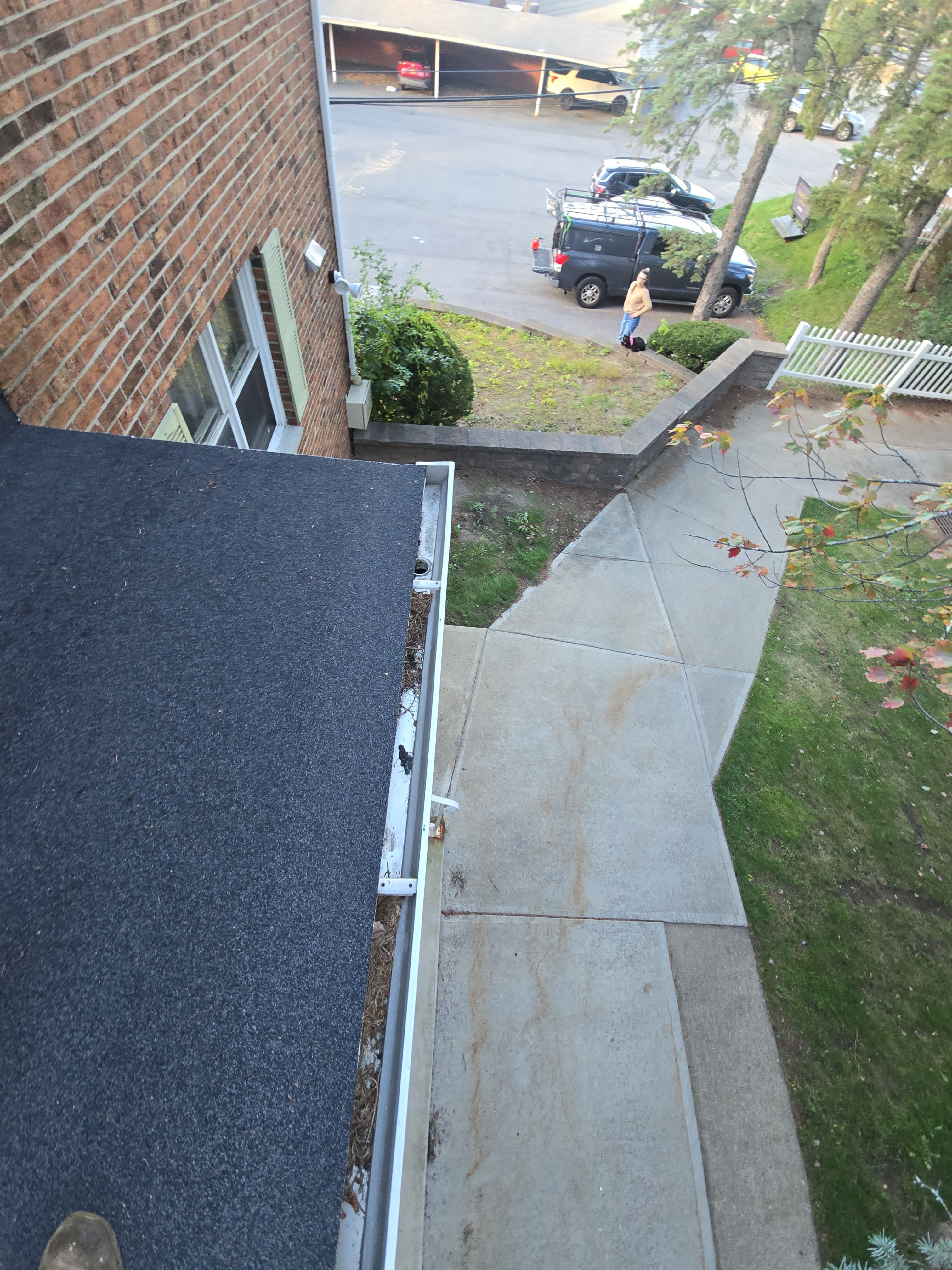 HOA gutter cleaning before photo.