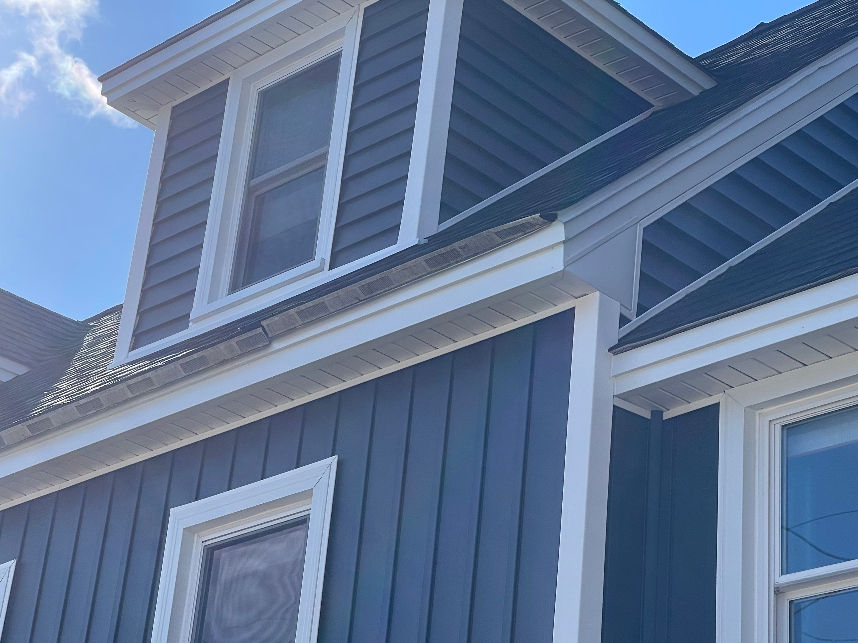 Complete Exterior Renovation with New Siding & Gutters   by Sensible Home Solutions
