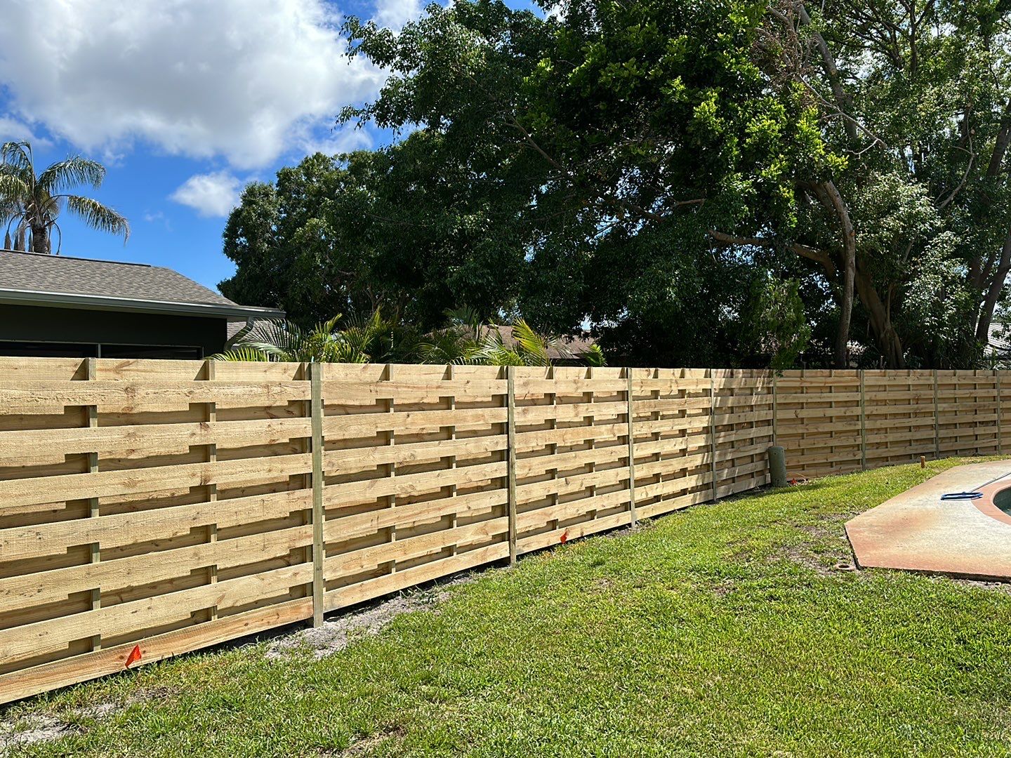 Wood Fence Installation using Horizontal Shadowbox Wood Privacy Fence by Asap fence and gates, LLC